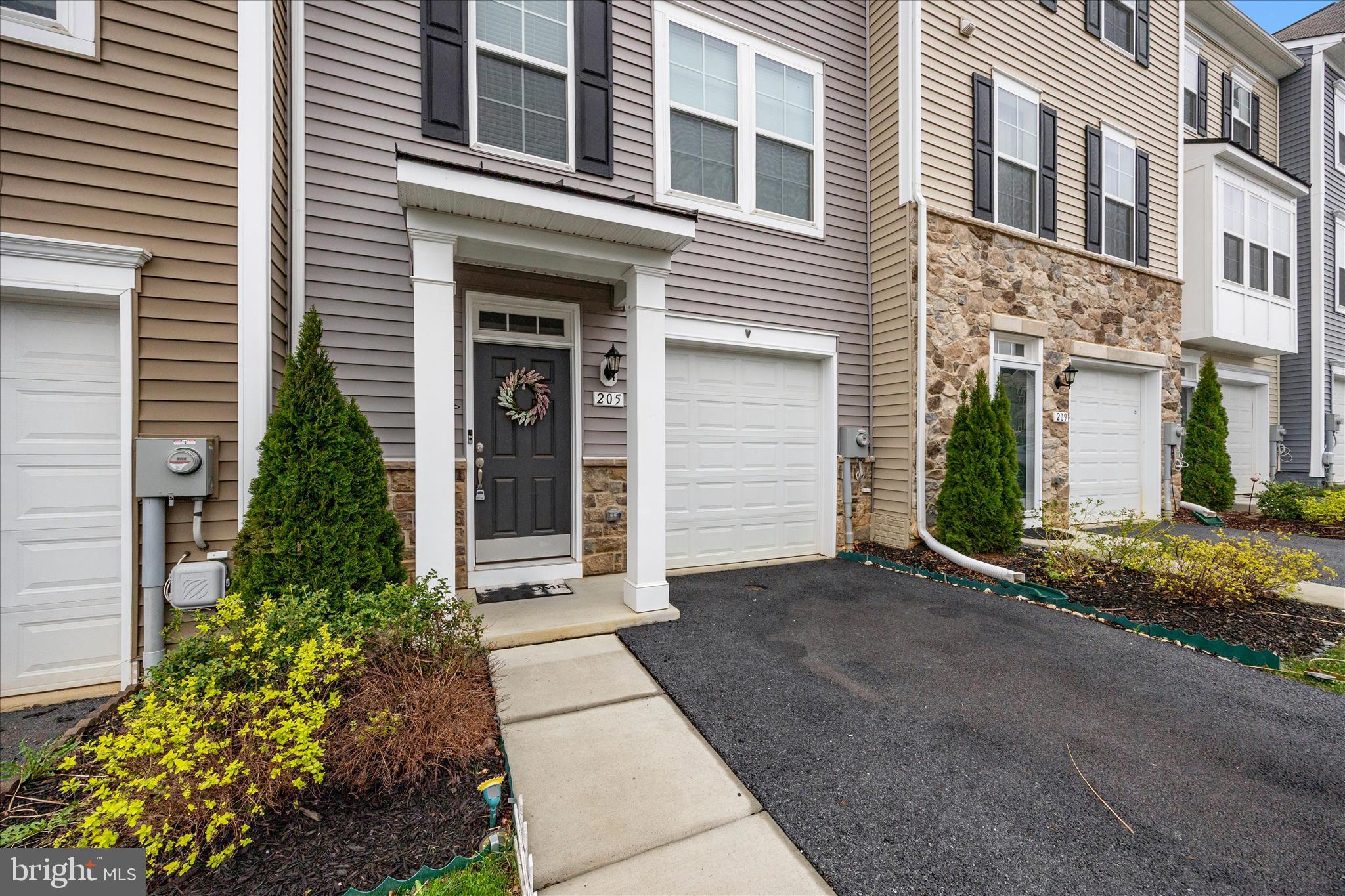 WHY  WAIT FOR NEW ??   4  Year Young DRB Home located in sought-after Huntfield Community in Charles Town, WV.  This 3 Bed, 2.5 Bath home offers modern finishes, open concept living, and three fully finished levels designed for today’s lifestyle.
The entry level foyer features luxury vinyl plank flooring, a finished recreation room, and walk-out access to a fully fenced rear yard, perfect for entertaining, pets, or outdoor living.
The main level boasts a bright open floor plan with a spacious living room, powder room, and a gourmet kitchen complete with large center island, granite countertops, stainless steel appliances, gas cooking, and table space dining area. Step outside to the low maintenance composite deck, ideal for grilling and relaxing.   Upstairs, enjoy a large primary suite with vaulted ceiling, walk-in closet, and private en suite bath. Two additional bedrooms with vaulted ceilings, a full bath, and upper level laundry provide convenience and functionality.     Located in the amenity-rich Huntfield neighborhood, residents enjoy walking trails, tennis courts, basketball courts, and a community pool (coming soon). This home is conveniently located near downtown Charles Town, with easy access to shopping, dining, commuter routes, and Northern Virginia/Maryland corridors.   Priced to sell, this home won't last long...hurry!!