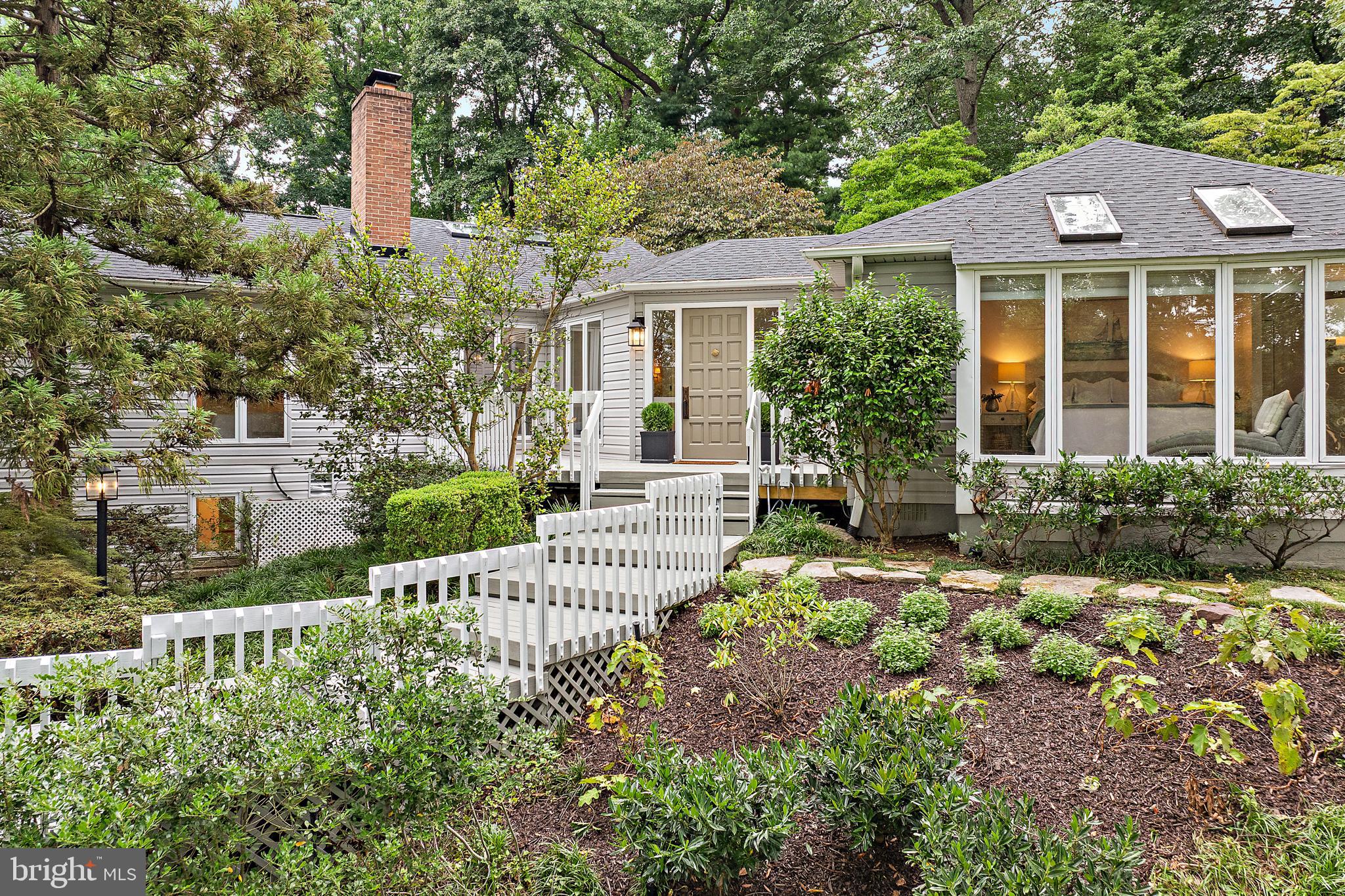 Beautifully renovated throughout, this exceptional 6-bedroom, 4-bath residence with separate guest quarters offers the perfect blend of timeless charm and modern comfort on picturesque Gibson Island. Designed for effortless entertaining and everyday living, the home is truly move-in ready. Filled with natural light, the spacious living room features a redesigned wood-burning fireplace and flows seamlessly into the dining room, creating an inviting setting for both everyday living and special occasions. At the heart of the home, the expansive open-concept kitchen and family room, enhanced by new appliances and beautiful hardwood floors, opens directly to a private patio, an ideal space for outdoor dining, morning coffee, or summer gatherings. Thoughtfully designed with privacy in mind, the home's flexible layout provides comfortable spaces for everyone to gather or retreat. The main-level primary suite enjoys tranquil water views, while the additional living spaces easily accommodate family, guests, or a home office.  Outside, a serene Japanese garden surrounds the property, offering peaceful places to relax and enjoy the island's natural beauty. Additional highlights include a two-car garage, abundant storage, a greenhouse, and covered walkways that thoughtfully connect the property's living spaces.  With extensive recent improvements including a new roof, renovated bathrooms, updated lighting, refinished interiors, and countless thoughtful enhancements throughout—this home combines classic Gibson Island character with the ease and confidence of modern updates. Just in time for summer, this exceptional property offers a rare opportunity to enjoy the beauty, privacy, and distinctive lifestyle of Gibson Island.