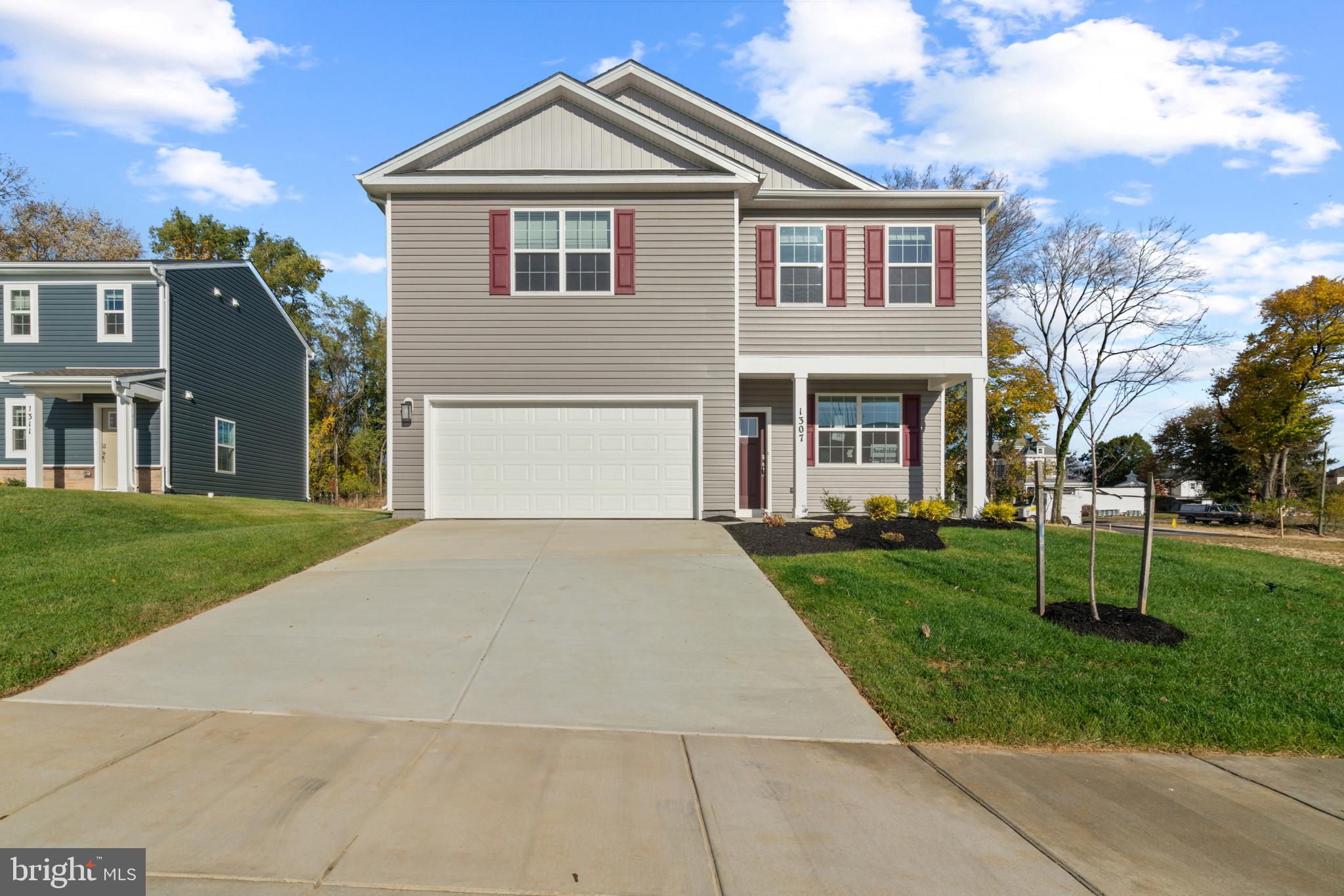 This charming 2-story, 2148 square foot home is designed for both style and functionality. With four bedrooms and 2.5 baths, it provides plenty of space for comfortable living and entertaining. On the main floor, luxurious vinyl plank (LVP) flooring extends through the open living areas blending durability with a modern look. The kitchen is a highlight, featuring sleek quartz countertops and stainless-steel appliances that bring a contemporary touch to the space. Ample cabinetry provides plenty of storage, and the kitchen flows seamlessly into the living area, making it easy to cook, dine and entertain. Upstairs, you'll find all four bedrooms, including a spacious owners suite with an en-suite bathroom. The additional three bedrooms share a second full bathroom, while a convenient half bath is located on the main floor for guests. One of the homes unique features is that the lot comes partially fenced, with the back lot line having a 6' White Vinyl Privacy Fence. Whether you're enjoying the view from the living room or stepping out back, the fence adds a sense of privacy, creating an ideal setting for outdoor relaxation or gatherings...and cost savings on a full fence after moving in! This home offers a perfect blend of modern amenities, comfortable living spaces, and outdoor space for all of your activities.