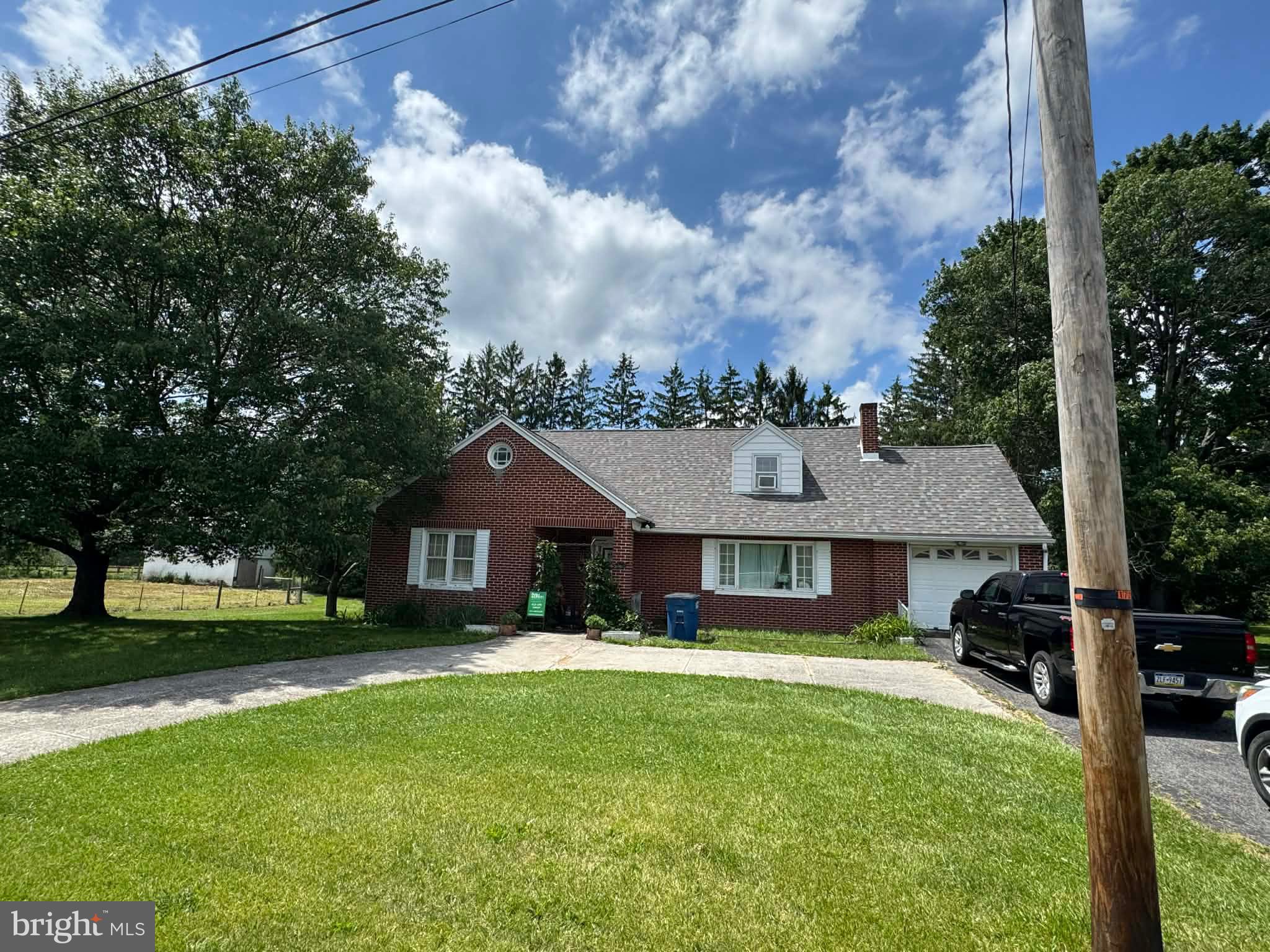 Brick rancher farmette with barn and small fenced in area for animals, 4 bedrooms, 2 bathrooms with plenty of room in the basement to refinish.  Partially finished in basement.  Has beautiful fireplace in the basement, 2 year old outside storage shed and plenty of room to have fun in the outdoors.  Being sold "AS IS".