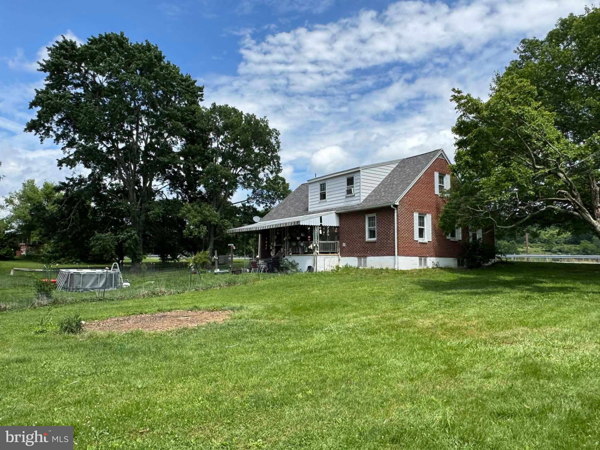 Brick rancher farmette with barn and small fenced in area for animals, 4 bedrooms, 2 bathrooms with plenty of room in the basement to refinish.  Partially finished in basement.  Has beautiful fireplace in the basement, 2 year old outside storage shed and plenty of room to have fun in the outdoors.  Being sold "AS IS".