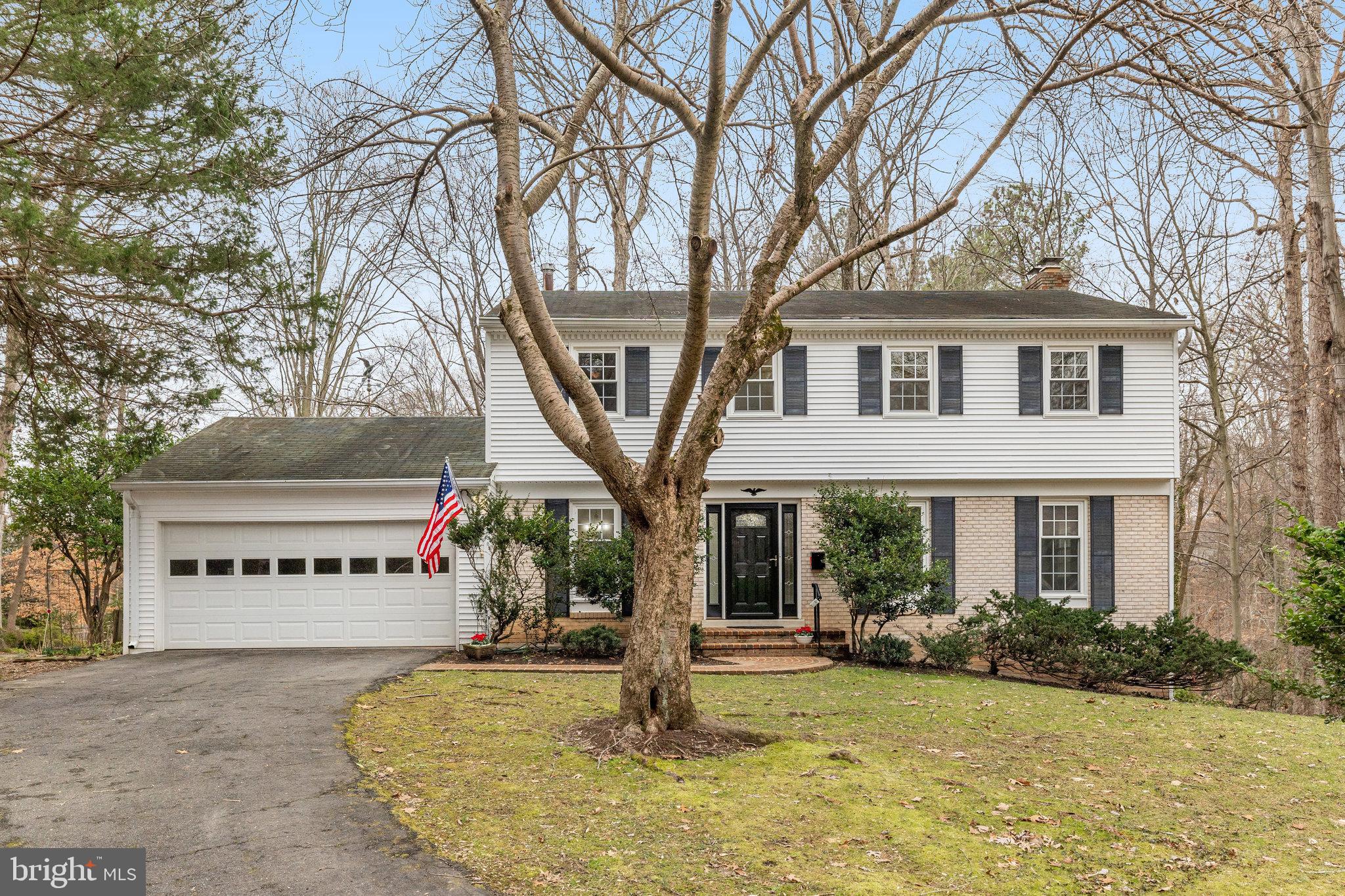 Open House cancelled. ***RARELY AVAILABLE HOME in sought-after Chapel Square West! Perfectly located at the end of a cul-de-sac and directly next to GORGEOUS parkland that is owned by the HOA- you'll feel like you are on a permanent vacation! Freshly painted throughout! BRAND NEW stainless steel appliances in the kitchen (Dishwasher, stove and built-in microwave) and NEWER Washer and dryer in the extra large laundry/mud ROOM- complete with access to garage, kitchen AND backyard! Updated kitchen has a pantry and room for a table- all overlooking the yard, parkland, and TREES galore! Family room just off the kitchen has the first of two brick fireplaces with access to the back deck- wonderful for parties or just day to day relaxing! Refinished hardwood flooring throughout the main level- you'll love the room sizes-you can fit ALL your furniture! Upstairs are FOUR EXTRA LARGE bedrooms with great closets and all hardwood flooring, Spacious Walk-out level basement is bright and has a wet bar, a full bathroom and extra spaces for storage and/or hobbies! Amazing location! Easy access to DC, two airports, shopping, parks and more!Don't miss this rare opportunity!