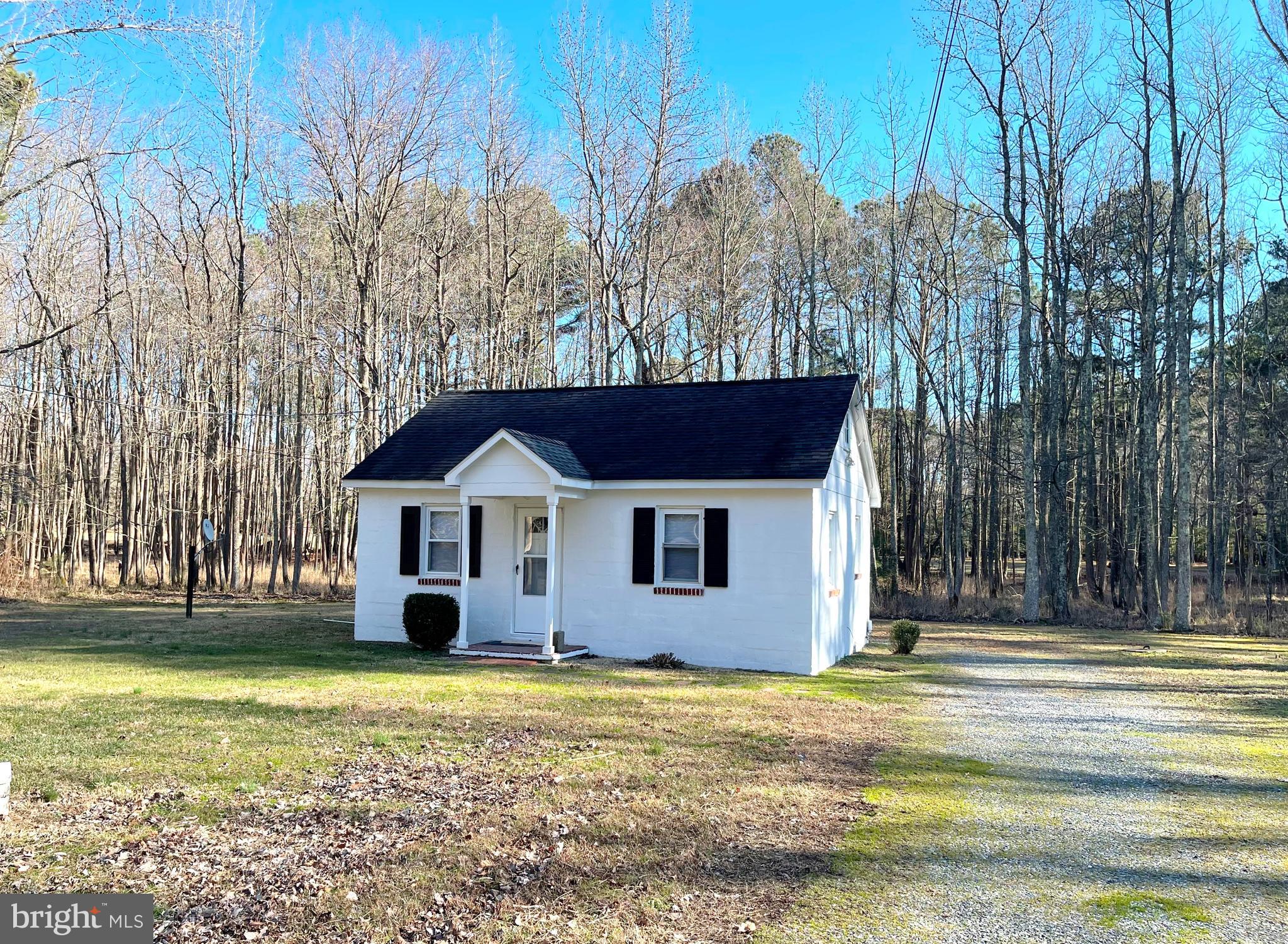 Recently freshened 1BR 1FB bungalow style home backing to wooded privacy.   On the main level is the kitchen, dining area, living room, bedroom and full bath with a limited ceiling height loft style area on the upper level.   Storage shed with power located behind home.  Owner supplies professional lawn care service included with rent.  Pets considered on a case-by-case basis.  Property is located very close to St Marys College, Coast Guard Station St Inigoes, Webster Field Navy Annex and Point Lookout State Park.  NAS PAX and the many amenities of Lexington Park are approx 20 mins to the North.