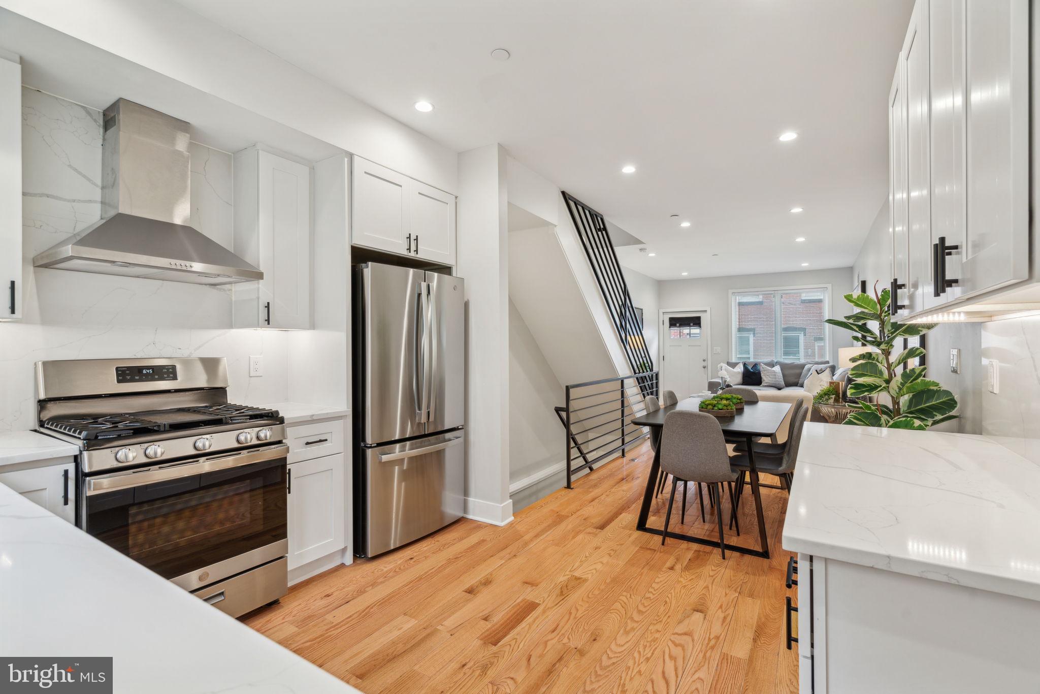 Discover modern luxury in this newly constructed 4-bedroom, 2.5-bathroom home in the vibrant Brewerytown neighborhood. The open-concept layout showcases a sleek kitchen with high-end appliances, elegant countertops, and custom cabinetry, seamlessly flowing into spacious living and dining areas. Retreat to the finished basement, offering versatile space for a bedroom, office, or entertainment area. Enjoy outdoor living with a private backyard and a rooftop deck that provides stunning city skyline views. Luxurious bathrooms feature contemporary fixtures and finishes, adding to the home's sophisticated charm. With meticulous attention to detail throughout, this residence offers the perfect blend of comfort and style in one of Philadelphia's most dynamic communities.