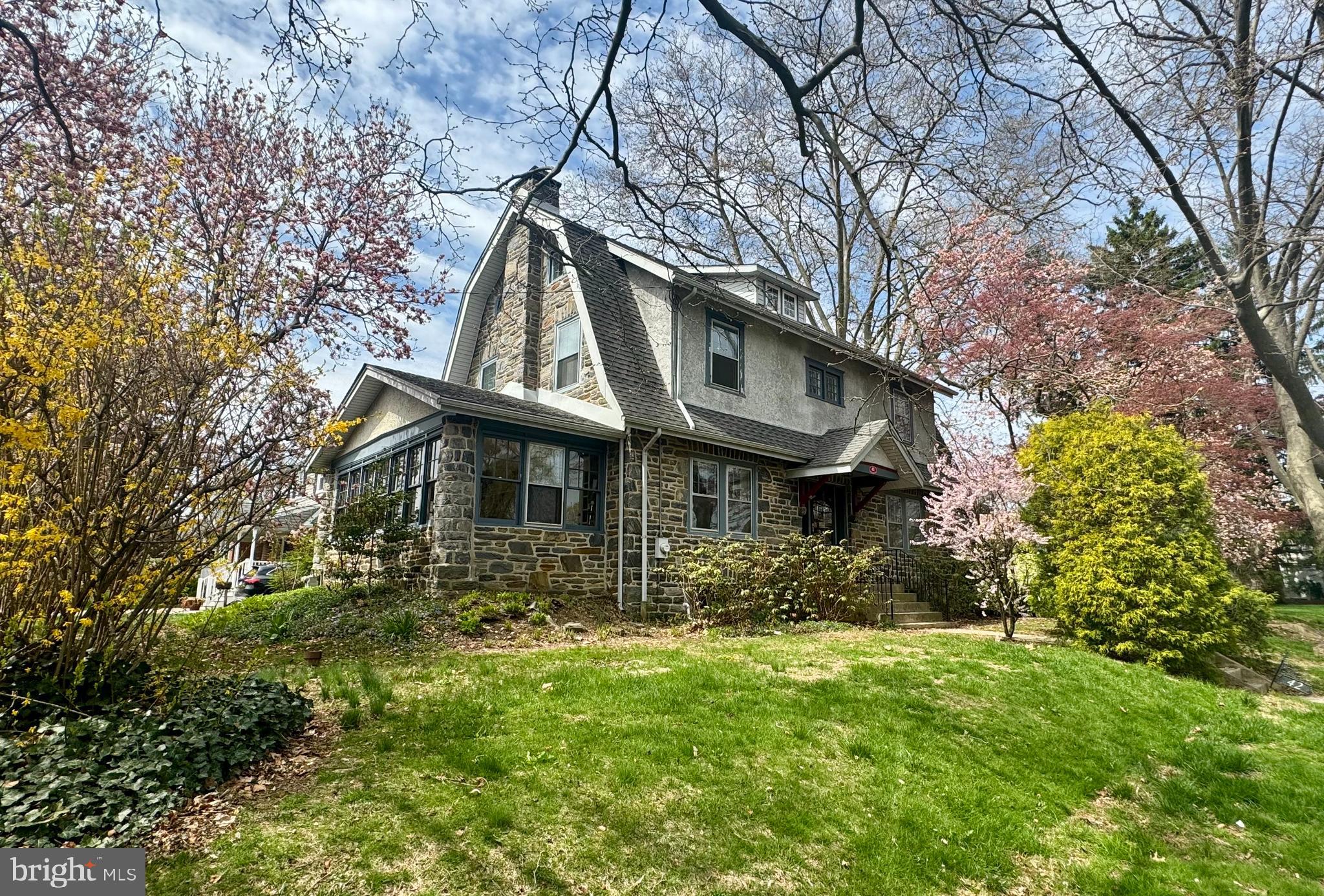 Welcome to 42 Ralston Avenue!  This stately 6-bedroom, 2.5-bath home built in 1921, offers a rare blend of timeless architecture and thoughtful modern upgrades. From the moment you step inside, you’ll be captivated by the tall ceilings, original trim work, and newly finished hardwood floors that flow throughout the home.

Enter through the front door and into the center hall foyer. This first floor offers tons of versatile living space. To the left of the foyer you will find a large yet cozy living room with a fireplace, lots of natural light and a beautiful sunroom off of it. The formal dining room flows into the kitchen with a breakfast nook. There is also an additional family room; perfect for relaxing and entertaining.

The second floor offers 4 nicely sized bedrooms and an updated full bathroom. Make your way to the 3rd floor with additional bedrooms and another full bathroom.
Outside of the home you’ll see a beautiful new patio space, perfect for summertime gatherings. There is also a large, detached 2 car garage off the driveway.

Situated on a quiet, tree-lined street in the heart of Havertown, this home combines classic elegance with everyday convenience—just minutes from parks, schools, and local shops.
Come experience the charm and character of this one-of-a-kind property. Schedule your tour today!