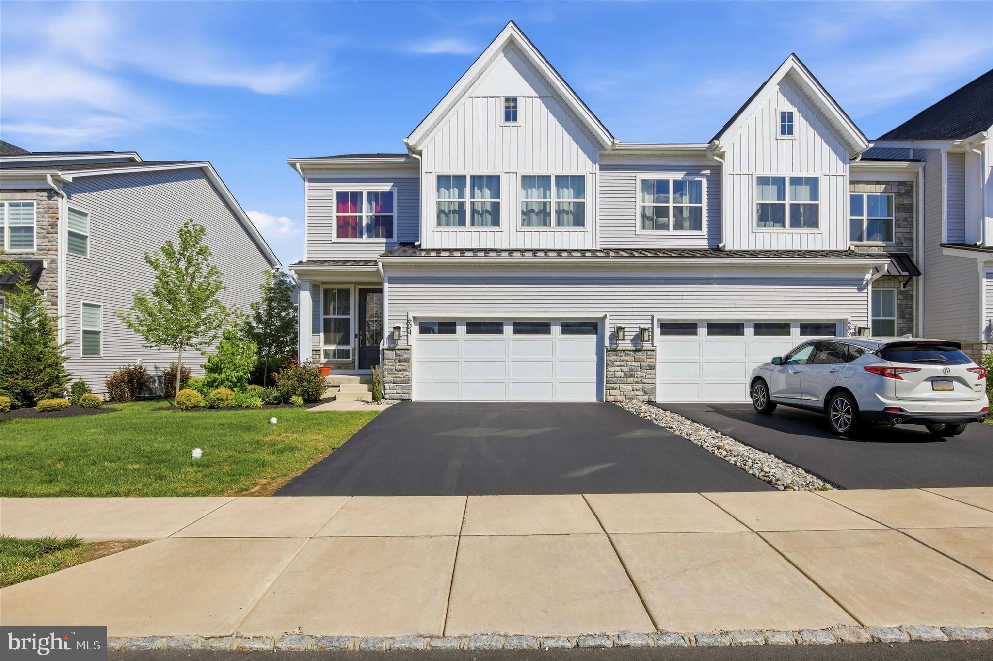 🌟 STUNNING UPGRADED HOME IN THE RESERVE AT EMERSON FARMS 🌟

Welcome to 604 McNair Drive, a beautifully upgraded Toll Brothers home (built in 2022) located in the highly sought-after Reserve at Emerson Farms, within the award-winning Central Bucks School District. Offering over 2,700 square feet of thoughtfully designed living space, this exceptional 4-bedroom, 3.5-bath residence blends modern luxury with everyday comfort.
Situated on a premium lot with a serene, green backyard, this home offers both privacy and lifestyle. Enjoy direct access to scenic community walking and biking trails, connecting to nearby elementary and high schools, as well as the popular Route 202 trail—perfect for outdoor living.
Conveniently located just minutes from Routes 611, 309, and the PA Turnpike, with easy access to the vibrant dining, shopping, and charm of Doylestown, New Hope, and Warrington.

✨ HIGHLIGHTS & FEATURES

Bright, expanded family room with oversized windows, elegant fireplace, and direct access to a private deck
Gourmet kitchen featuring a quartz island and countertops, stainless steel appliances, upgraded cabinetry, designer hood, and a spacious walk-in pantry
Upgraded hardwood flooring throughout the main level, continuing seamlessly into the second-floor hallway
Custom wood-finished staircase adding warmth and sophistication
Striking wood-paneled fireplace feature wall, creating a warm and elegant focal point
Luxurious primary suite with a dream walk-in closet and spa-like ensuite bath
Secondary en-suite bedroom, ideal for guests or flexible living arrangements
Two additional spacious bedrooms with a shared full bath
Three full bathrooms upstairs plus a convenient powder room on the main level
Unfinished basement offering endless potential for customization
Located in the highly desirable Kline Elite section, featuring premium upgrades throughout

✨ WHY YOU’LL LOVE THIS HOME
This home perfectly combines modern design, premium upgrades, and everyday functionality—all within one of the most desirable communities in Bucks County. Whether you're relaxing on the deck, entertaining in the open-concept living space, or enjoying the nearby trails, 604 McNair Drive offers a lifestyle that’s both elevated and effortless.