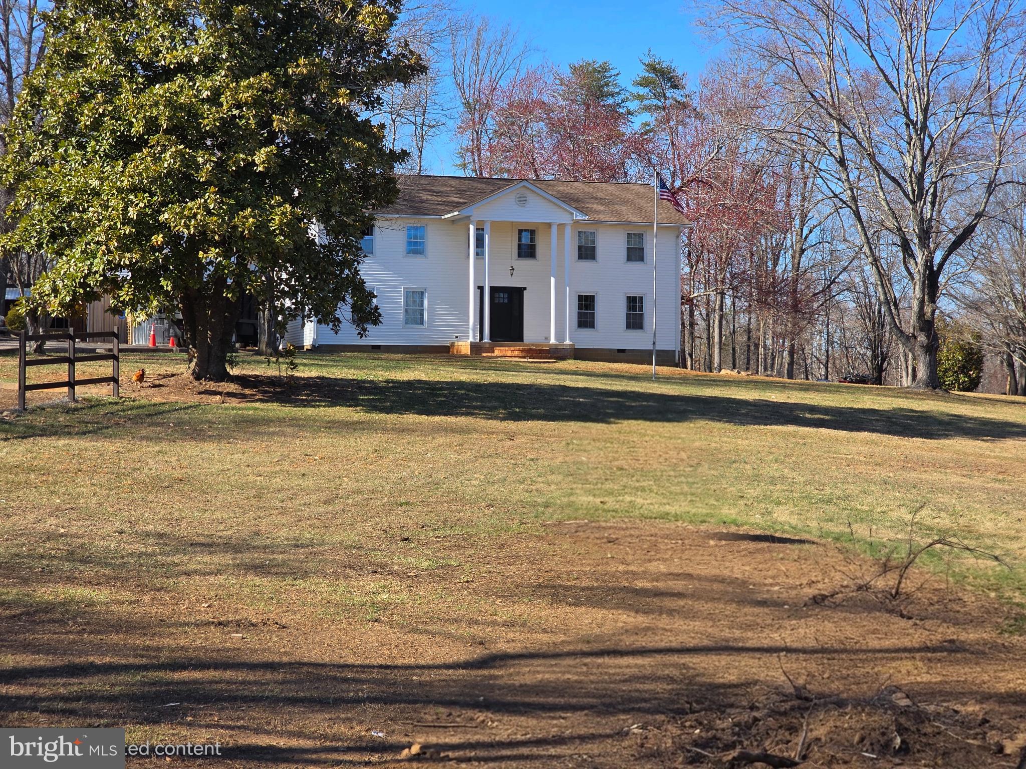 Welcome to "Waterbrook Farm" — a rare and versatile estate offering the perfect balance of refined residential living, income-producing potential, and natural beauty across 24.77 scenic acres in Unionville, Virginia.
Whether you're envisioning a private family retreat, a thriving event business, a multi-generational compound, or all three at once, Waterbrook Farm delivers the space, infrastructure, and setting to make it possible. The centerpiece of the property is a handsome two-story Colonial offering 5 bedrooms and 3.5 bathrooms across a thoughtfully designed floor plan. The updated kitchen is the true heart of the home — anchored by an oversized island, quartz countertops, and abundant cabinetry, it's as functional for everyday family life as it is for large-scale entertaining. Additional main-level living spaces include a separate dining room, a cozy keeping room, a fireside family room, and an enclosed mudroom off the kitchen with extra storage for freezers or refrigerators. A main-level bedroom with an en-suite bath and a guest half bath rounds out the main floor. Upstairs, the newly expanded primary suite offers a spacious private sanctuary with a beautifully updated en-suite bathroom with a walk-in shower, free-standing tub, dual sinks, a separate water closet, and a large expanded walk-in closet. Three oversized secondary bedrooms, a new hall guest bath, a dedicated laundry room, and an impressively large storage closet complete the upper level for more storage needs. A fully separate 3-bedroom, 1-bathroom, 960 sq ft apartment with a private balcony, kitchen, and laundry area provides outstanding flexibility — ideal for extended family, long-term rental income, or on-site staff. When combined with the main residence, the living quarters total approximately 4,288 sq ft. Additionally, at 4,659sf, the on-site event venue is a genuine business asset. Weddings, corporate retreats, milestone celebrations, and private gatherings are all at home here, set against the natural backdrop of rolling Virginia countryside. For the entrepreneurially minded buyer, this is a turnkey foundation for a revenue-generating hospitality operation. The property's 24.77 acres are as functional as they are beautiful. A 2+ acre stocked pond anchors the outdoor experience, offering a peaceful focal point for guests and residents alike. The land provides ample room for expansion, outdoor event space, agricultural use, or simply the privacy and breathing room that acreage affords. All structures combined total approximately 8,947 sq ft — an extraordinary amount of usable space for a property of this character, not to mention parking for a minimum of 50 vehicles. Now, if the entertaining venue area is not to your liking or needed, it can easily transform into a remarkable multi-vehicle garage, workshop, or more. Renovations are underway, and the transformation in progress will take Waterbrook Farm to an entirely new level. The vision is bold — and the results will speak for themselves. Properties that combine this much living space, income, infrastructure, and scenic acreage in Orange County simply do not come to market often. Waterbrook Farm is not just a home — it's a lifestyle, a business, and a legacy, all on one remarkable piece of Virginia. Schedule your private tour and see the vision firsthand.