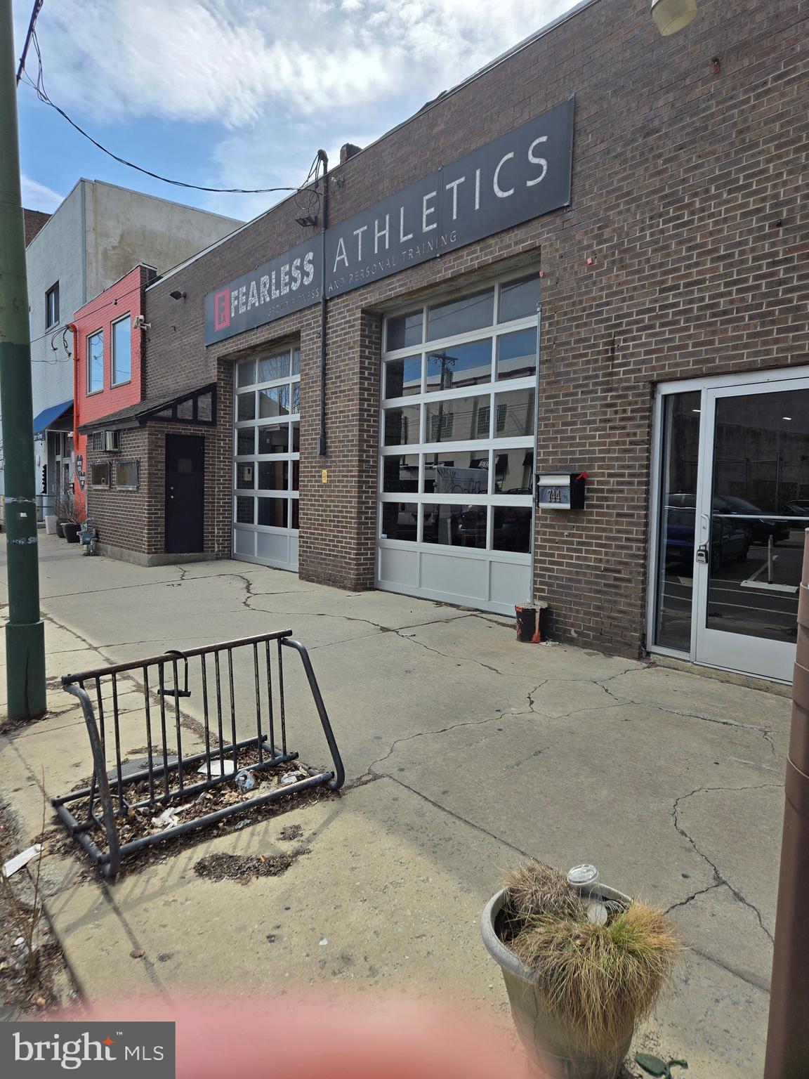 Large multi-purpose building located on a 52 x 88  Street to Street parcel  (4581 sq ft ) with many potential  uses or development opportunities.. Located in the prime Bella Vista neighborhood. Most recent use was a fitness center and a beer distributor prior to that.  There are 2 & 1/2 bathrooms  and an office space on the 2nd floor. Two 12 ft high garage doors and approximately 17 ft ceiling height. Prime location.

For additional information contact Co-Listing Agents:
 Robert Shuman 215-668-6868 or Wayne Leibovitz 215-852-9986
