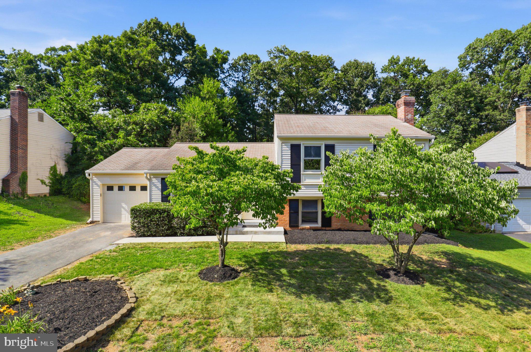 Welcome to 412 Cavendish Street in sought after Hunters Creek. This beautifully updated 4 bedroom, 2.5 bathroom home offers approximately 1,620 square feet of comfortable living space in a prime Herndon location. Step inside to a welcoming family room that flows into the updated kitchen and dining area. The kitchen features new stainless steel appliances, wood cabinetry, granite countertops, abundant storage space, and updated lighting. Fresh paint, new luxury vinyl plank flooring, and updated lighting throughout make this home move in ready. The dining area opens through sliding glass doors to the all seasons room with brand new carpet, creating the perfect space for relaxing, entertaining, or enjoying views of the flat grassy fenced backyard. Outside, you will find new landscaping and a storage shed for added convenience. Upstairs, the primary suite offers double closets and a private en suite bathroom. Two additional bedrooms and a full hall bathroom with a jetted tub and shower complete the upper level. The lower level features a spacious recreation room with a charming brick fireplace, built-ins, a fourth bedroom with an attached half bathroom, and a laundry room, offering flexible space for guests, work, or play. Ideally located near Runnymede Park, the W&OD Trail, and the Town of Herndon’s shops, dining, and live entertainment. Commuters will appreciate the close proximity to the Herndon Metro Station and Dulles Airport. Optional pool membership adds to the appeal of this wonderful community.