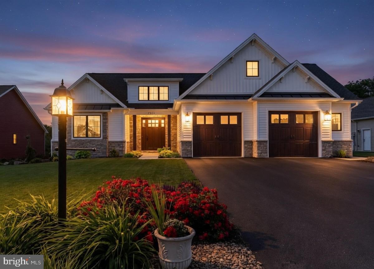 Discover unmatched craftsmanship and modern elegance in this "better than new" custom-built Musser home, nestled on a right-sized 0.36-acre lot in the Stonehill Farm cul-de-sac subdivision of South Middleton Township. Surrounded by 60 acres of perpetually preserved farmland, this property offers nature's peacefulness without the maintenance. From the moment you arrive, you’ll be captivated by the home’s Craftsman-style architecture, lavish mahogany front door, and thoughtful attention to detail throughout. Inside, you're greeted by stained 10.5' coffered ceilings in the main living room with distressed hickory floors and a cozy stone fireplace.  The heart of the home features a fully loaded chef’s kitchen with a generous island, textured countertops, walk-in pantry, and abundant natural light that seamlessly flows into the comfortable "keeping room" with vaulted ceilings and a custom built-in coffee bar—perfect for quiet mornings or casual entertaining.  The expansive first-floor primary suite boasts tray ceilings, a charming window seat, and spa-inspired bath with porcelain tile floors, his & her vanities, and a walk-in shower.  Upstairs, you’ll find two well-appointed guest bedrooms and a full bath, providing ample space for family or visitors.  The full basement comes with roughed-in plumbing, finished stairs, windows providing natural light, and walkout exterior steps—ready for finishing.  Other highlights include a main level office with sliding barn door, mudroom off garage with built-in bench and storage cubbies, high-end Marvin windows, reverse osmosis water system, whole-house ERV, oversized two-car garage with additional miniature side garage door for your mower or equipment, and private south-facing rear exposure providing winter light to living areas.  This construction quality must be seen in person to appreciate.  Located just minutes from I-81 and Downtown Carlisle attractions.