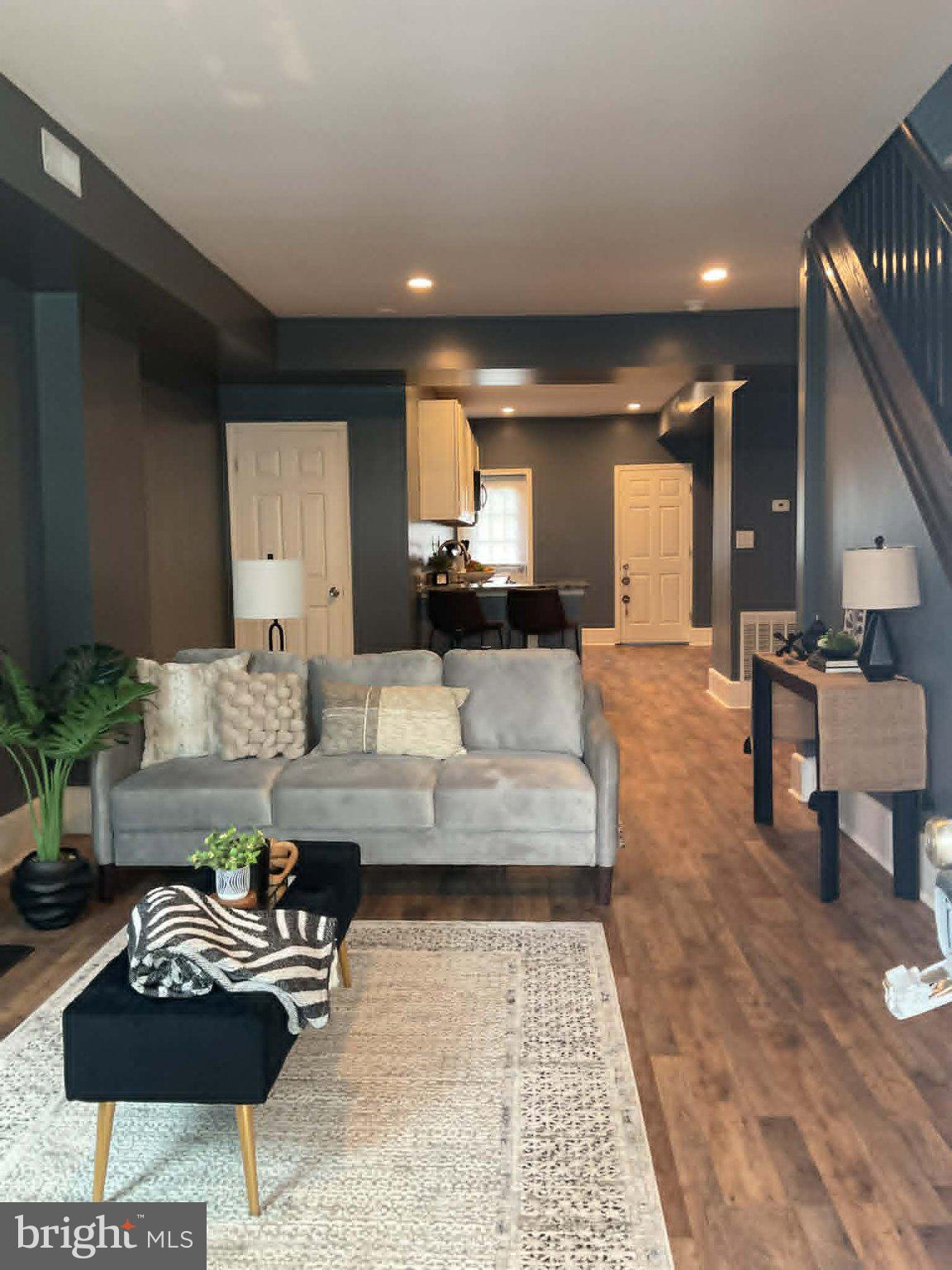 🔥 Cozy up by the fireplace! This beautifully renovated 4-bedroom, 3-bathroom Baltimore townhouse blends charm and modern upgrades. 🏡 Featuring marble countertops, stainless steel appliances 🍽️, and in-unit washer/dryer 🧺. Electrical updated ⚡, new HVAC ❄️🔥, and a brand-new hot water heater 💧. Move-in ready—city living at its finest! ⭐