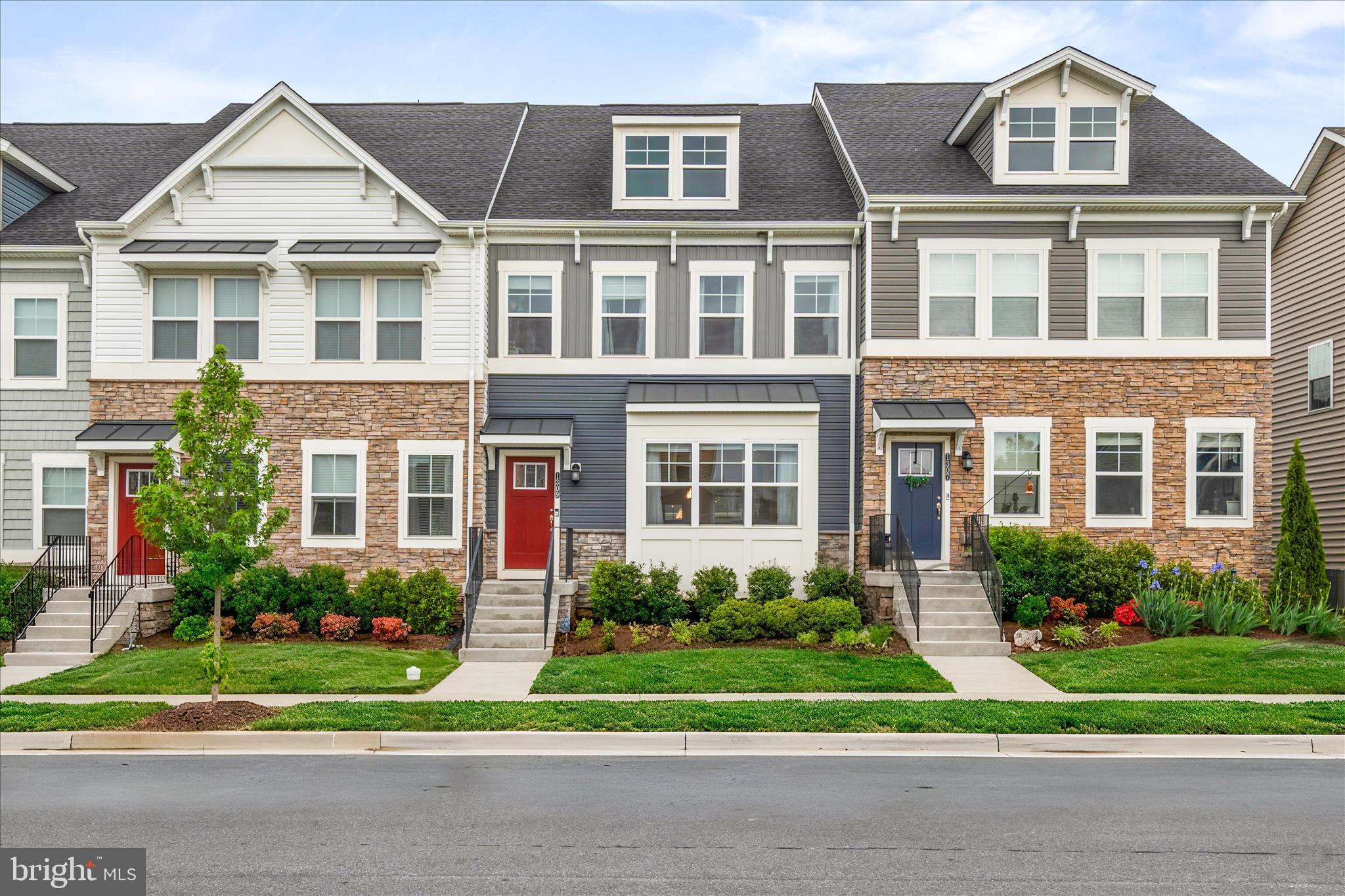 Price improvement!! Welcome to Brunswick Crossing, one of Frederick County's most sought-after communities, where this stunning three-level townhome with a detached two-car garage checks every box. From the moment you step inside, the wide-open main level draws you in with unobstructed sightlines from front to back, making it ideal for both everyday living and effortless entertaining. The kitchen is the centerpiece, anchored by an oversized island topped in white quartz, a six-burner gas range with a custom hood, double wall ovens, under-counter microwave, and a butler's pantry with built-in wine rack flowing into a generous walk-in pantry.  Head upstairs to find a serene primary suite with tray ceiling, walk-in closet, and a dual-sink ensuite, plus two additional bedrooms, a full bath, and an upper-level laundry. The fully finished lower level offers a spacious rec room, a private flex room with walk-in closet and full bath - perfect for a home office or guest suite. Out back, a large composite deck off the dining area extends your living space with zero-maintenance ease. All of this just minutes from MARC train service at Brunswick Station, Route 340, downtown Frederick, and everyday shopping and dining.