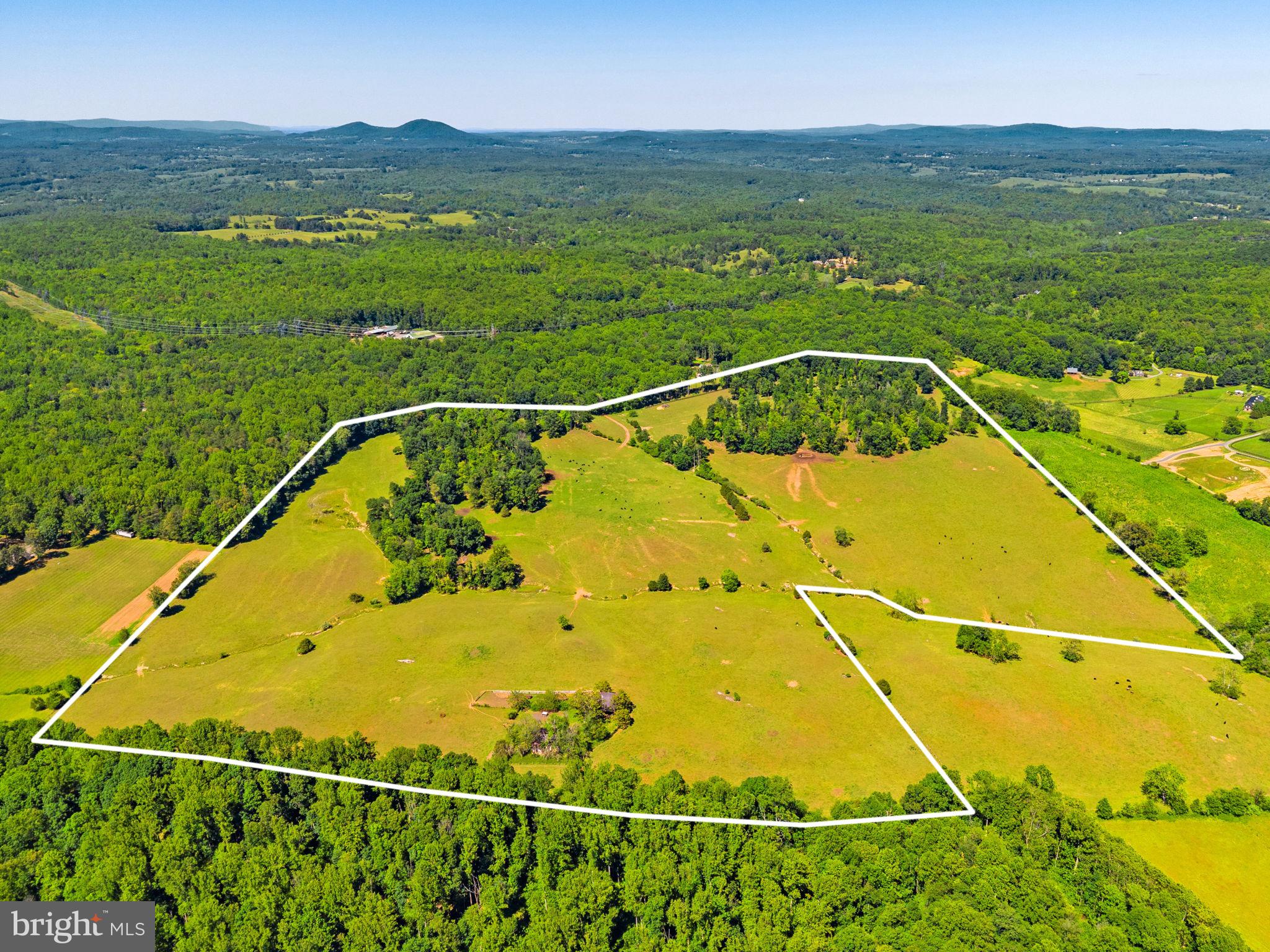 BUILDERS!!!!!  PROPERTY MAY BE ABLE TO BE DIVIDED INTO 10 LOTS....WITH COUNTY APPROVAL ....Experience 100 acres of breathtaking beauty, where mountain views, flowing creeks, open meadows, and peaceful woods come together to create an exceptional setting. This rare offering includes two separate parcels of 50+ acres each, (Additional Tax ID : 23-7) being sold together, with the potential for future division.
The entire property is fully fenced, making it ideal for livestock, horses, or anyone seeking a ready-to-use agricultural or recreational retreat.
Owned by the same family since 1947, this land carries a rich history and a sense of care that’s hard to find. Whether you’re dreaming of a private estate, a working farm, or a serene getaway, this property offers unmatched privacy, versatility, and natural beauty..
Truly one-of-a-kind—this could be the legacy property you’ve been searching for.