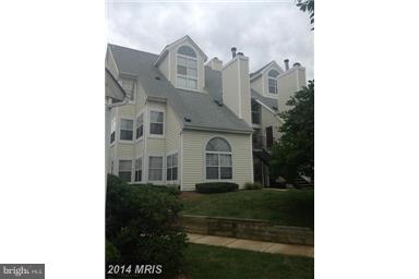 CUTE and COZY! This 2 bedroom condo is meticulously maintained and shows extremely well.  Newer Windows and HVAC system.  Home boasts HW FLOORS,  new LPV floors, CROWN MOLDING, FRENCH DOORS and a FIREPLACE for those cold winter nights! Just walking distance to shops and restaurants and minutes away from the up and coming "Town Center at Laurel"