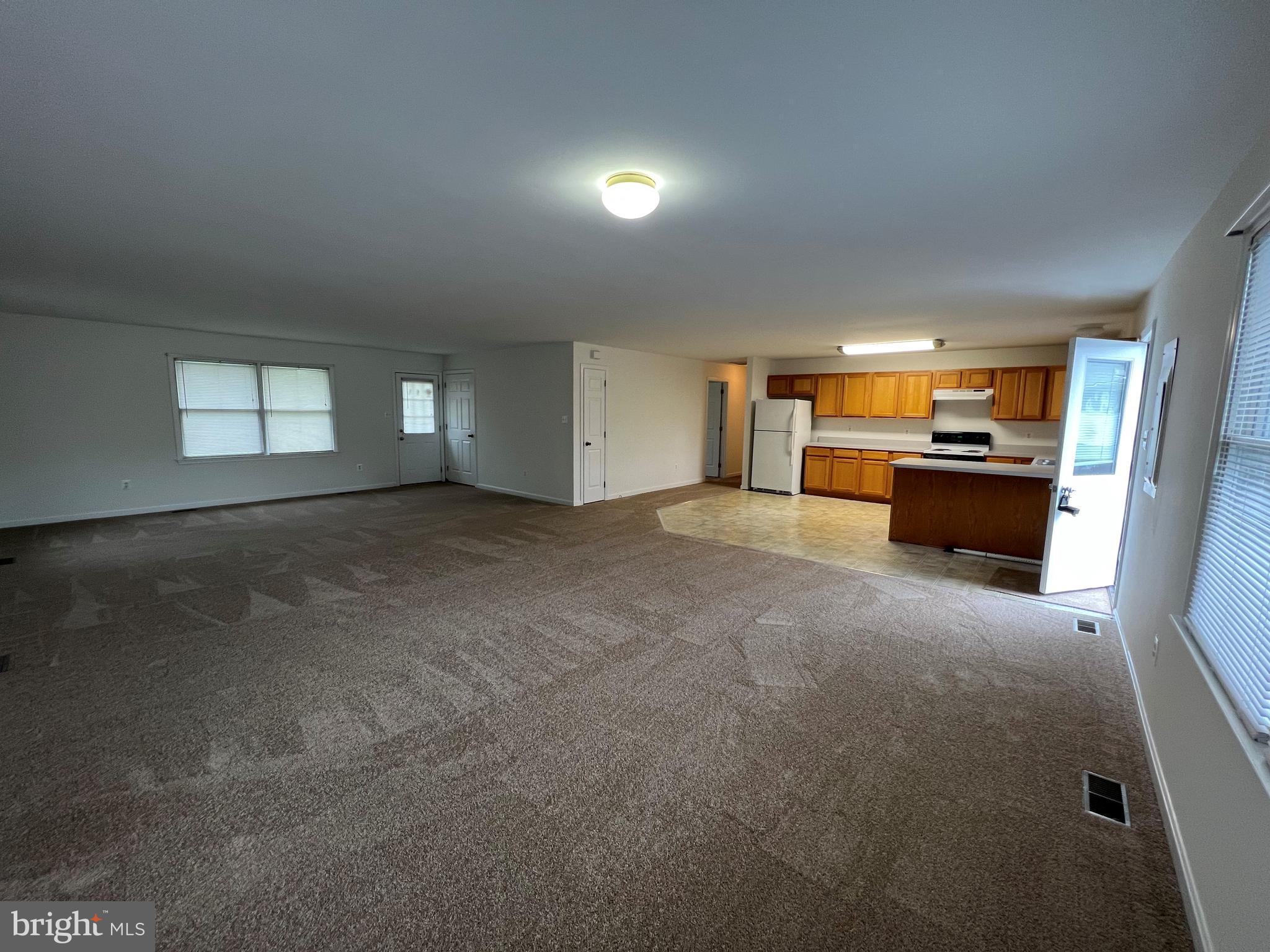 Great end unit one story apartment in small community.  Freshly painted, new carpet.  Water, sewer, trash included.  Convenient location closing to dining and grocery shopping.  No pets allowed.