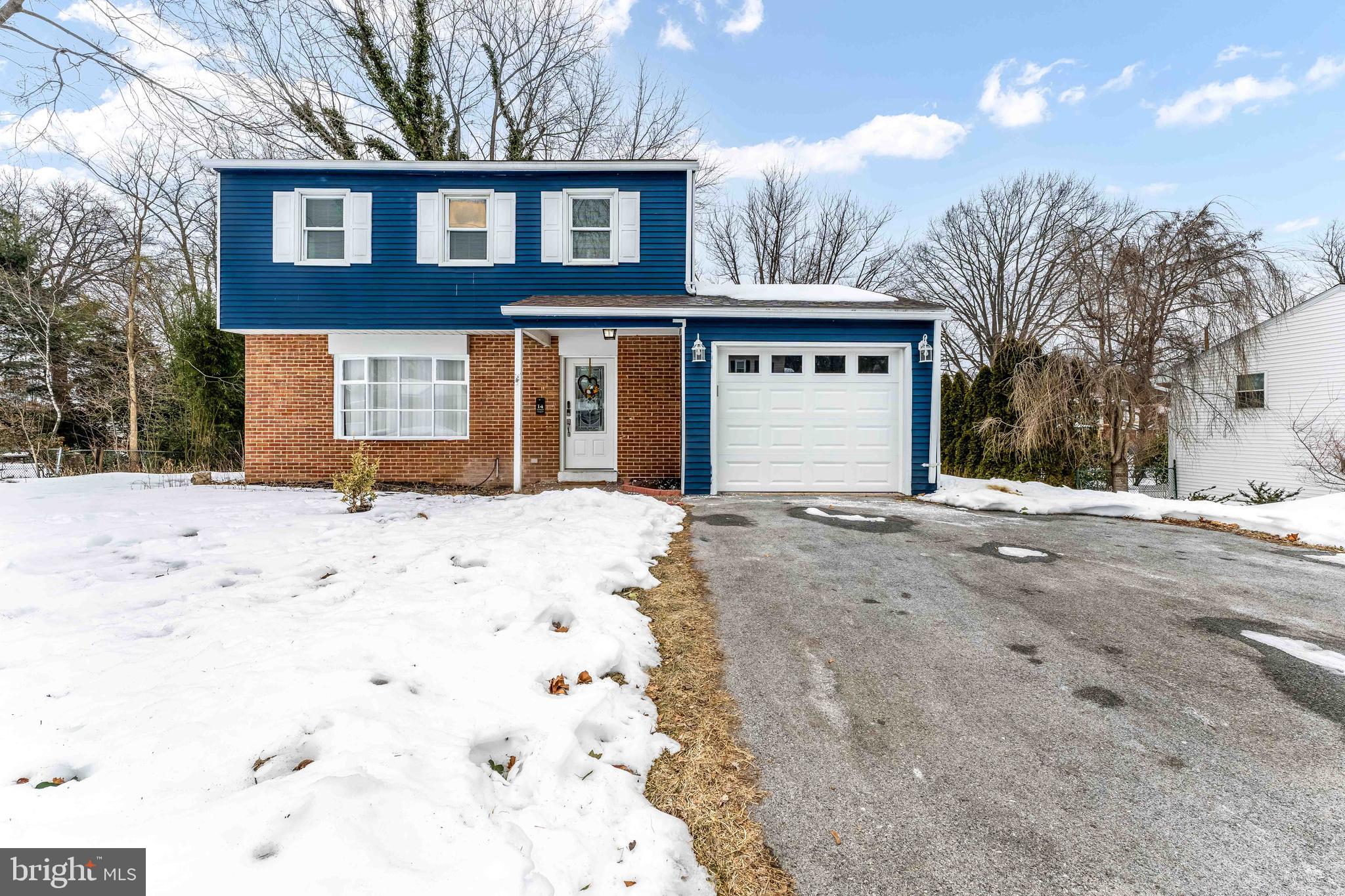 Here is your corrected version without square footage mentioned and cleaned up for MLS clarity:

This beautifully maintained 2-story traditional home offers 4 bedrooms and 2 fully remodeled bathrooms, along with a walkout basement, all situated on a spacious 0.26-acre lot.

Step inside to a bright and inviting living room that flows into the updated kitchen and dining area, creating a functional and comfortable layout perfect for everyday living and entertaining. The home features modern finishes throughout, including updated flooring, recessed lighting, and a clean, contemporary feel.

All four bedrooms and two full bathrooms are conveniently located on the main level, offering practical one-floor living flexibility. The full walkout basement provides additional space for storage, recreation, or future finishing possibilities.
Both full bathrooms have been stylishly remodeled with updated vanities, modern fixtures, upgraded tile, and clean designer finishes.

The full basement offers excellent additional space for storage, a workshop, or future finishing potential. A brick fireplace adds character and warmth to the lower level living area.