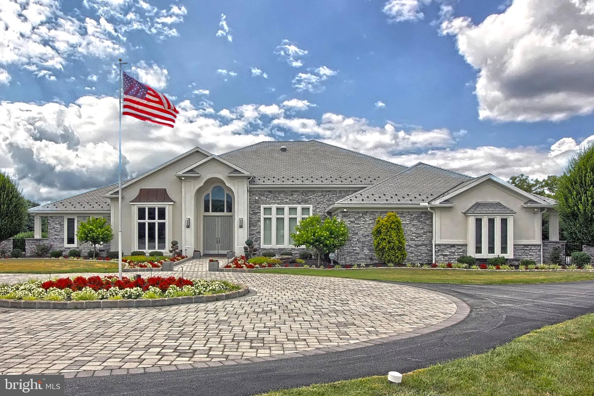 Meticulously designed & built 4,886 sq. ft. stone & stucco rancher with an unbelievable home theater on a secluded 5.74 acre lot at the end of a cul-de-sac in desirable East York has traditional looks with cutting edge technology & style.  You will be blown away by the traditional Art Deco design 8 seat home theater with high ceilings, designed by Theo Kalomirakis theaters,  it’s own dedicated HVAC zone, automated curtains, hand made, leather, power recliner seats from Canada & traditional stage, accent & courtesy lighting.  Don’t miss the high tray ceilings, the LA custom designed, the Snaidero Kitchen with timeless kitchen cabinetry , the custom built-in hardwood bookshelves & coffered walls made entirely of Rift Sawn White oak & cathedral ceilings, the exercise room, the recessed motorized blinds & the in-ground, swim up bar pool with authentic boulder waterfall & grass roof cabana house!  This 4 zone, ultra efficient, high tech hardwired & Wifi connected home impresses on ever level!  Hurry - don’t miss this extremely well thought out estate!