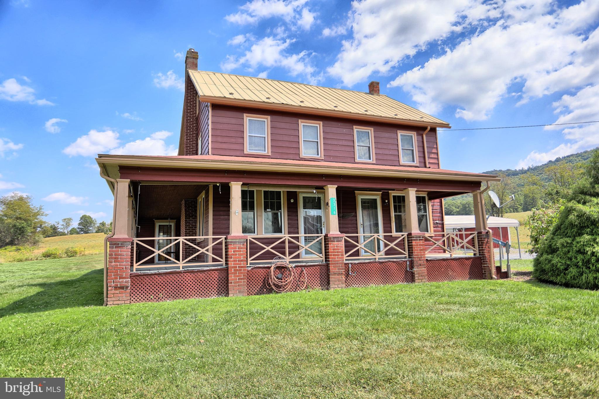 New Year, New Home?  This late 1800's 5-bedroom home, originally part of the family farm, has preserved many of the unique features of farmhouse living with its wrap-around porch, front and back staircases, "farm kitchen" dining room and much more! Built for family, the 2nd floor layout, with generous hallways and unique built-ins, easily accommodates a front and back "wing" for privacy.  Full bath includes walk-in shower stall and functional vintage tub. Rural setting creates breathtaking views and open sky for stargazers. Two-car garage offers space for the car enthusiast or hobbyist, and 2-car free-standing carport provides an extra protected parking from summer sun and winter snow. Just minutes from downtown McConnellsburg and Fulton County Medical Center. Let your imagination run wild and make this home your own with some TLC and elbow grease! Home is being sold AS-IS. Motivated Seller. *Property has been winterized*