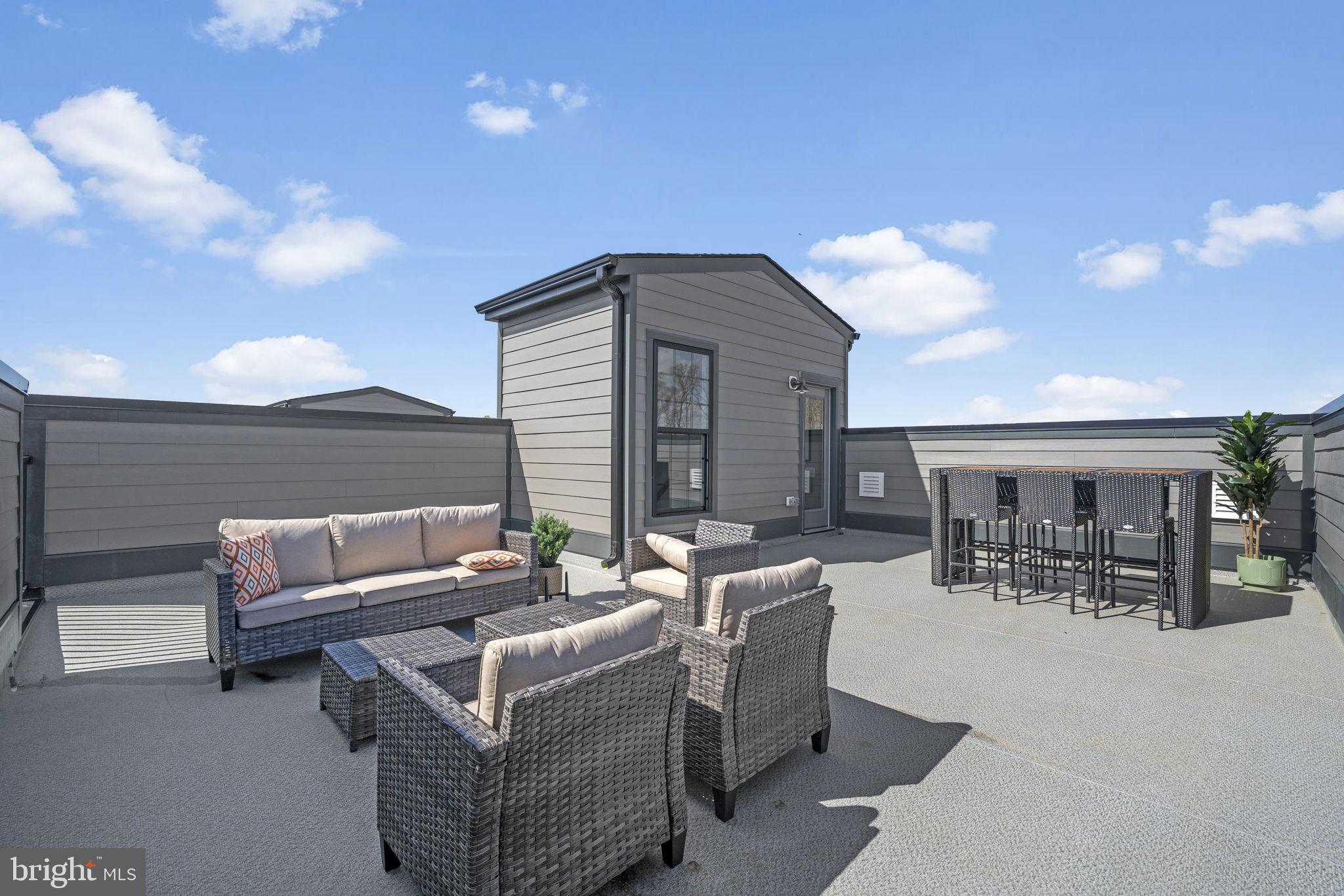 MOVE-IN READY! Brand new Stanley Martin townhome-syle garage condo at Ashbrook Place! Introducing The Julianne, a stunning new townhome-style 3-bedroom garage home that is truly a gem, now with an added rooftop terrace. Fall in love with the open, light-filled main level design, which boasts an expansive gourmet kitchen, dining, and family room, and private study providing the perfect space to host an intimate dinner party or a large gathering. Step outside onto your sprawling rooftop terrace and enjoy breathtaking views of your surroundings, making it the perfect outdoor retreat to enjoy coffee in the morning, an alfresco lunch, or entertaining friends and loved ones for an exciting game night! Make your way upstairs and you will find three bedrooms including a spacious primary suite that feels like your own private retreat, perfect for unwinding after a long day. The addition of the rooftop terrace enhances the luxurious lifestyle this home has to offer Photos shown are from a similar home. Contact us to schedule a tour!

Ashbrook Place is walking distance to One Loudoun. Live right in the center of everything One Loudoun and the surrounding Ashburn area has to offer including a variety of restaurants, shopping, and entertainment options, just minutes from your new home. Visit us today!