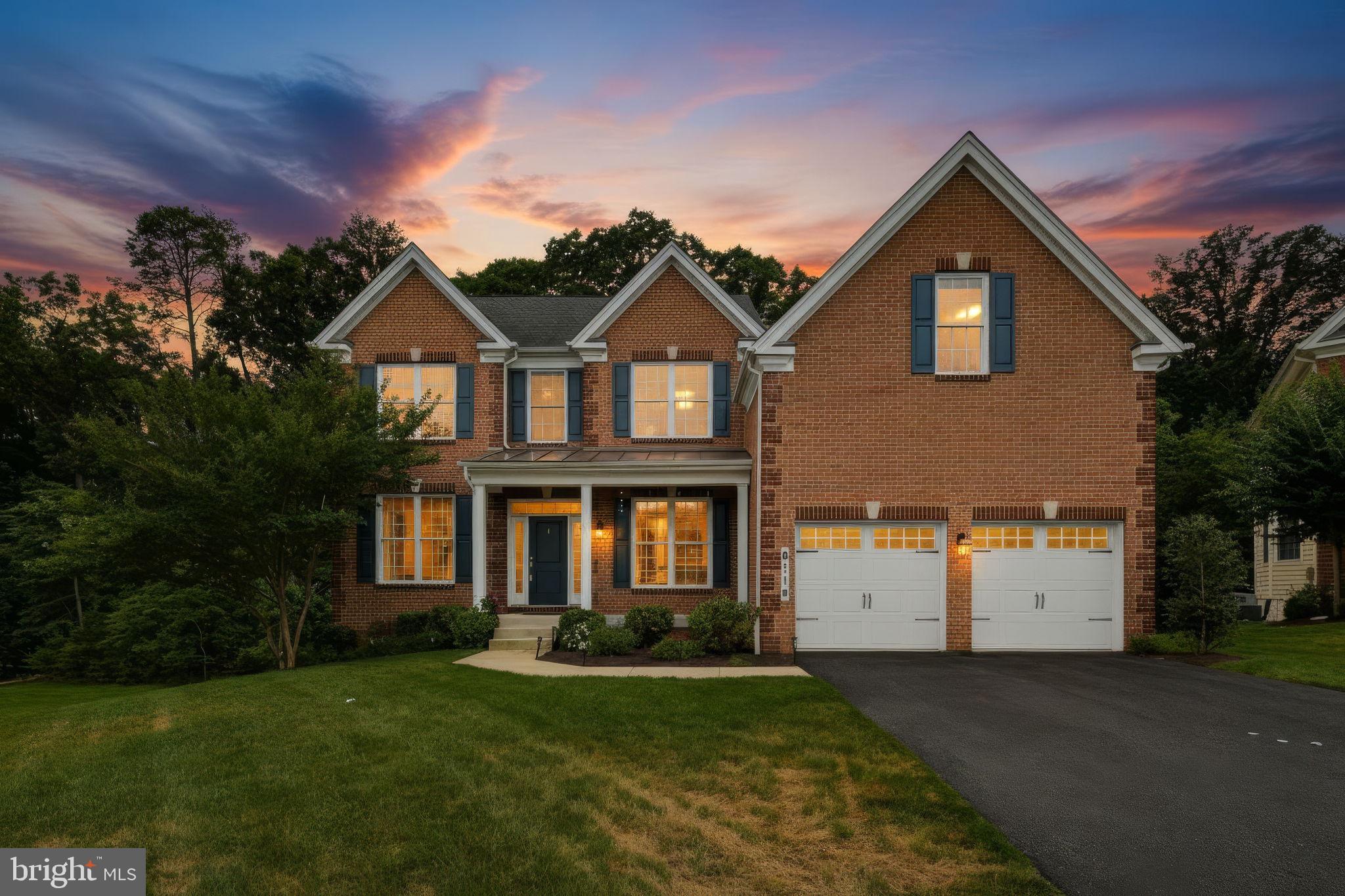 Welcome to 8114 Tulip Poplar Ct, Severn, MD — an impressive and beautifully maintained colonial offering over 4,000 square feet of finished living space above grade, plus an expansive unfinished basement ready for your vision. Set on a private, tree-lined lot, this home combines generous room sizes, timeless finishes, and exceptional flexibility for today's lifestyle.

The main level welcomes you with a two-story foyer flanked by formal living and dining rooms, both featuring hardwood flooring and elegant crown molding. A private office provides the perfect work-from-home space, while the spacious family room offers hardwood floors, a cozy gas fireplace, and abundant natural light. 

The heart of the home is the well-appointed kitchen, complete with hardwood flooring, a large center island, granite countertops, stainless steel appliances, a gas cooktop, a pantry, and a bright breakfast nook for casual dining. Just off the kitchen, the vaulted sunroom creates a light-filled retreat with views of the backyard. A convenient half bath is on this level, as well as the mudroom/laundry area, which gives quick access to daily tasks and serves as an entry point to the heart of the home from the attached two-car garage, providing convenience and storage.

Upstairs, the spacious primary suite serves as a true owner's retreat, featuring a tray ceiling, recessed lighting, dual walk-in closets, and a private en-suite bath. The generously sized and luxurious primary bath includes dual vanities, a soaking tub, a separate walk-in shower, and ample storage. Three additional spacious bedrooms provide plenty of space for family and guests, as well as a second-story family room with a vaulted ceiling for lounging or entertaining. A large shared hall bath features a double-sink vanity and tub/shower combination.

The lower level offers approximately 1,900 square feet of unfinished basement space, providing endless possibilities for future expansion, recreation, storage, or a custom design tailored to your needs. It also includes a rough-in for easy installation of another full bathroom.

Outside, enjoy the low maintance Trex deck overlooking a private, wooded backyard, adjoined by protected green space, creating a peaceful setting for outdoor dining, entertaining, or simply relaxing in nature. Below the deck is an expansive paver patio space with a bonfire area for late nights outdoors and enjoying the fresh air. 

Ideally located near shopping, dining, and entertainment at Arundel Mills, Waugh Chapel Towne Centre, and The Village at Waugh Chapel, this home also offers convenient access to Fort Meade, NSA, BWI Airport, Baltimore, Annapolis, and major commuter routes including I-97, Route 100, and Route 32.

A rare opportunity to own a spacious, well-appointed home with room to grow in one of Severn's most convenient locations. Make it yours!