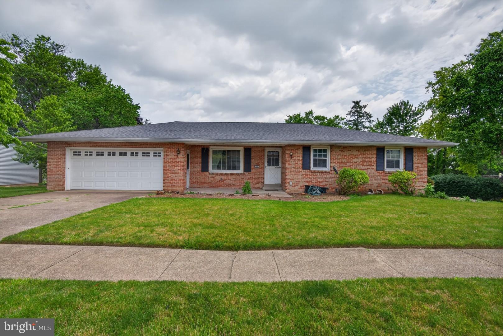 **THIS IS AN AUCTION SALE. THE STARTING BID IS NO INDICATION OF THE FINAL SELLING PRICE. This 4BR / 3 Full Bath Brick Ranch Home boasts a newer roof, replacement windows, a private primary suite, and a fully finished lower level with a kitchenette and direct access to a spacious backyard. Rare Opportunity to Own a Home in Indian Creek! Property Highlights: 4 BR, 3 Full Bath; Replacement Windows; Newer Roof; Forced Air Heat Pump; Central A/C; Primary En Suite; Beautiful Hardwood Floors; Solid Surface Countertops; Dedicated Laundry Room; Wood Burning Brick Fireplace; Large Bonus Family Room w/ Kitchenette; 2 Car Garage; Covered Front Porch; Rear Patio; Finished Walk Out Lower Level; Spacious Backyard; Shed; Public Water/Sewer; Indian Creek Community Pool and Recreation Club; No HOA; Cumberland Valley Schools; Total Taxes: $2911/yr. Nestled in a quiet, sought-after community, this home offers a peaceful setting while remaining conveniently close to shopping, dining, major highways, and everyday amenities.