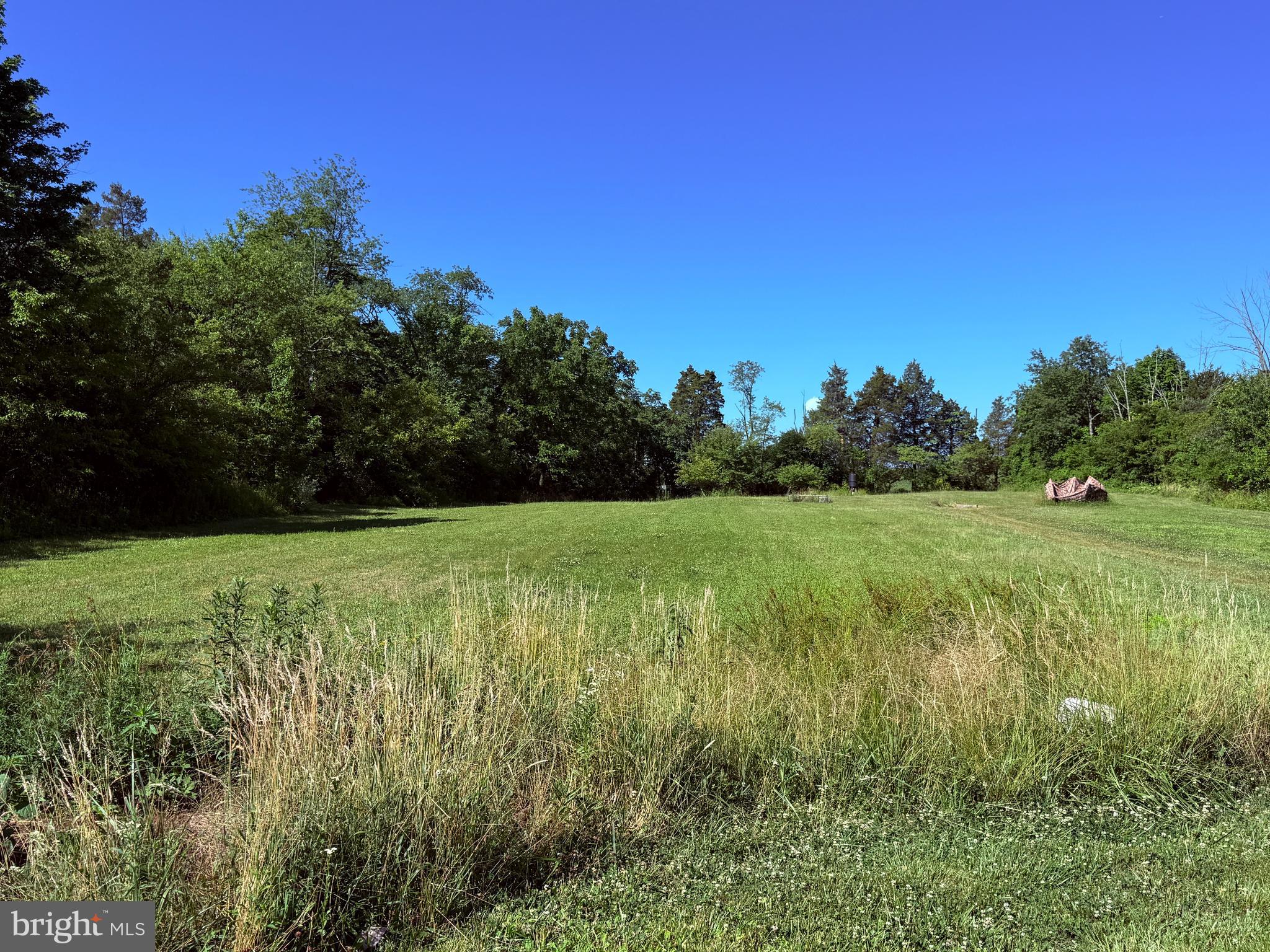 Rare opportunity to own 5.53 acres in desirable Skippack Township with potential subdivision possibilities. The existing dwelling and barn are situated near the front of the property, allowing the expansive open fields located throughout the middle and rear portions of the tract to remain largely unobstructed. Mature trees line the rear property boundary, creating a private and picturesque setting.

The existing dwelling is in dilapidated condition and is not habitable. The home is believed to require demolition. A barn is also located on the property and has partially collapsed. There is no access permitted inside the home.

Public sewer and a private well are currently on the property. Public water may be available; however, buyers are responsible for conducting their own due diligence and verifying the availability of public water, subdivision potential, zoning requirements, utility connections, and any intended use with Skippack Township and all applicable authorities.

Property is being sold as-is. All showings are by appointment only and must be accompanied by a licensed real estate agent. Do not enter the home or barn.