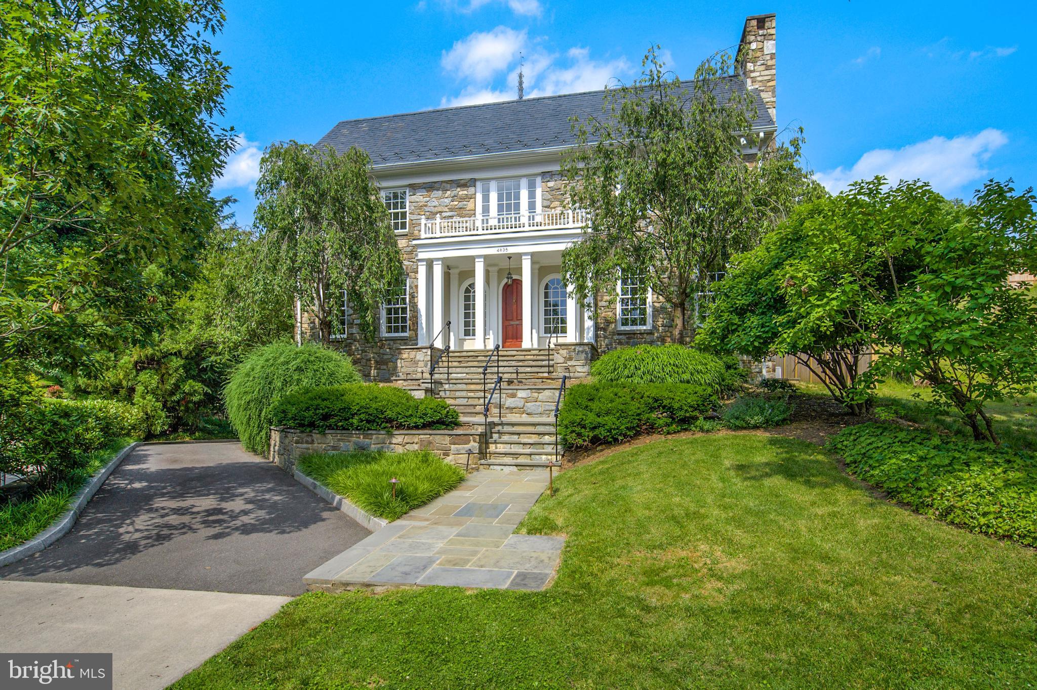 This beautifully maintained Federal situated in the heart of Spring Valley features spacious rooms for entertaining, bright bedrooms, and a gorgeous backyard with Patio and tiered Garden.  Flooded with natural light, this home features throughout include stunning hardwood floors, crown moldings, and soaring ceilings, not to mention the light-filled Family Room with 20ft coiffured ceiling. Complete with expansive Primary Suite with fireplace and large Walk-in Closet, and ample storage throughout, this home has everything. Includes 2- Car Garage & large Driveway.