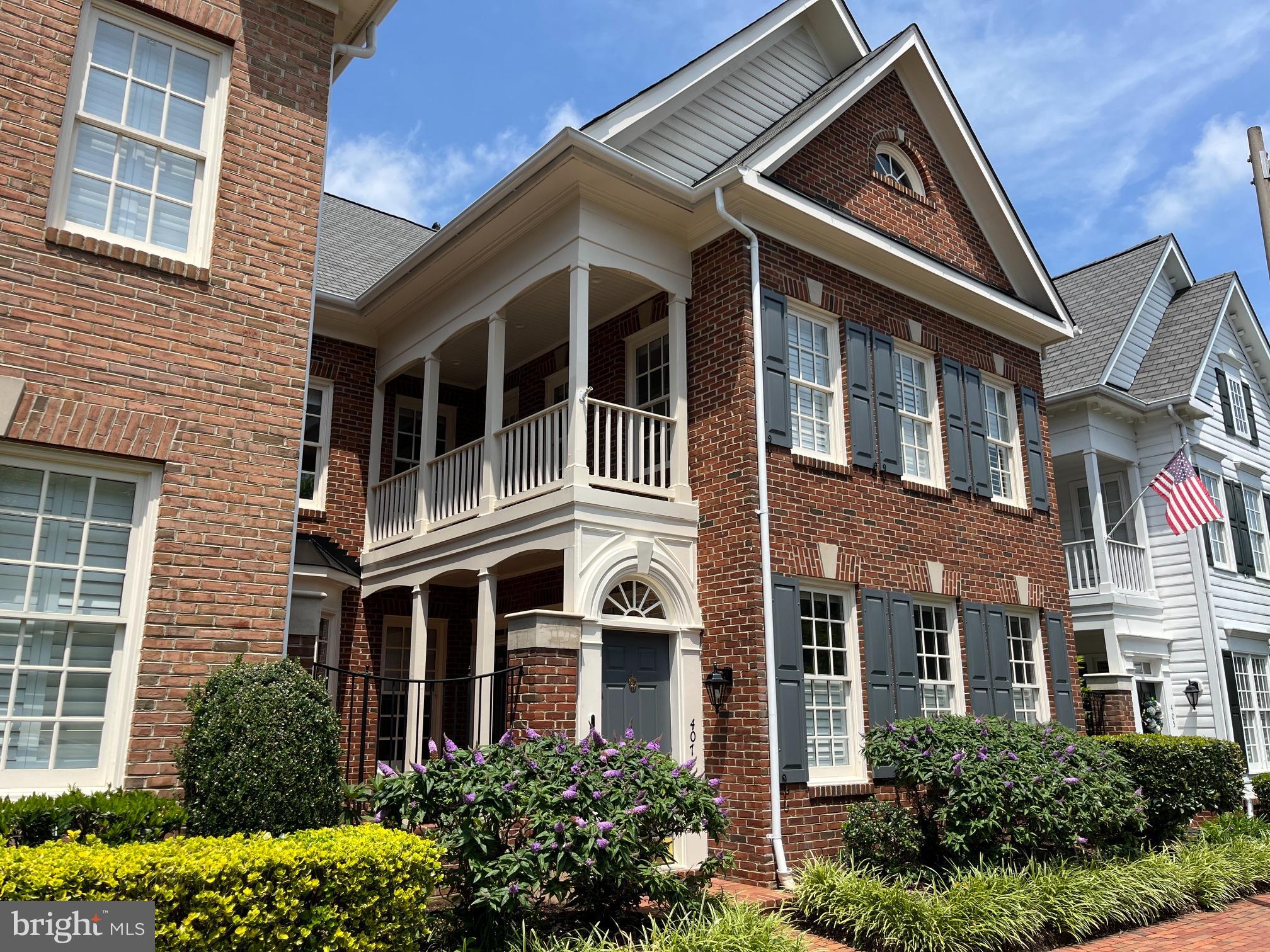 Where contemporary blends with classic to create the epitome of modern urban living.   With almost 2800 sf of updated living space, this home is an entertainer's dream combined with intimate cozy spaces for every day living. Walk through the courtyard door and step into the welcoming brick patio perfect for hosting neighbors for a happy hour celebration. Impressive columns form the entry to the formal living room that overlooks the sunny front courtyard. An open bright living space with sparkling hardwood floors combined with nine foot ceilings accented by crown moldings creates an air of comfort and design sophistication. The gracious dining room can accommodate large dinner parties with access to both the living room and the family room. The fireplace in the family room with surrounding built-in cabinets for display and storage as well as a bay window overlooking the front courtyard is the perfect place to settle in for a fun movie night or snuggle up and read your favorite book. Step through to the gourmet kitchen with every amenity a chef could dream of - large island with seating, custom European cabinetry with lighted display, expansive soapstone counters, chef's appliances including a Wolf oven, Sub Zero refrigerator, and a Thermador Schott Geran induction cooktop, and if that is not enough- heated floors!  Sit at the huge island and have views through the glass door to a private patio ideal for al fresco dining. Just down the hall is a convenient mudroom with built-in shelves, a sink, and a  closet that makes for the ideal  access to the two car garage filled with tons of built-in storage cabinets and a durable epoxy floor. Upstairs open the French doors into the primary suite - an incredible escape from the city! Soaring cathedral ceilings, room to accommodate a king bed and multiple seating areas including a private balcony with Trex deck that overlooks the courtyard below. This exceptional primary suite includes a spa bath that rivals a chic boutique hotel with double quartz vanities, an oversized custom tile shower with glass enclosure, and a laundry area with convenient ironing station.  The sitting area with cozy fireplace makes a large dressing area with two HUGE walk-in closets.  The second bedroom also has soaring cathedral ceilings, multiple large closets with organizers, and a French door that opens to community views. The third bedroom is the perfect home office or exercise space - whatever compliments your lifestyle. The updated shared hall bath has a dual vanity and tub shower great for accommodating guests. 

Old Town Village is the ideal city community with all the suburban amenities you could want - a saltwater pool, clubhouse with meeting space, library and gym, and community events. Just four blocks from King Street's eclectic shops and acclaimed restaurants, only a quick walk to Metro and Whole Foods, and a fun stroll to active nightlife along the riverfront - everything to do and see is just outside your front door! Ready to move in and start enjoying your Old Town life? This is the one for you!

NOTE:  Elevators and stair chairs have been added to other homes with this floor plan.