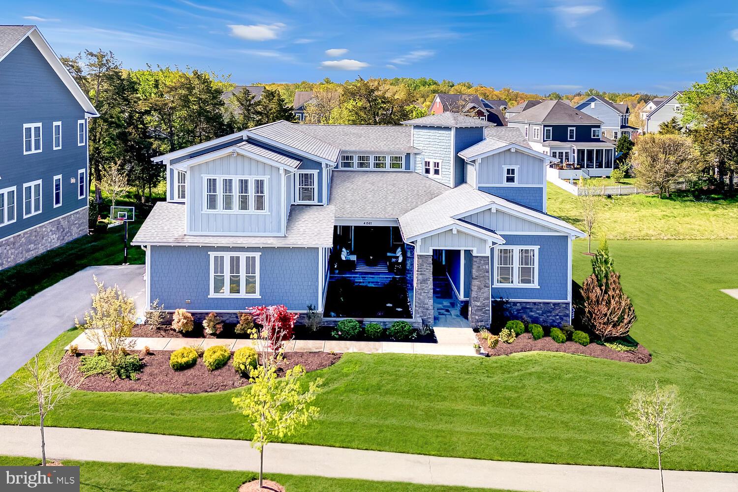 Immerse yourself in the epitome of luxury living with this spectacular estate home, nestled on a premium lot in Ashburn's most prestigious neighborhood. This exceptional Kirkland model by Arcadia Homes is a masterpiece of design, boasting an array of incredible upgrades and features that redefine opulence.
<br><br>
From the moment you approach, the home exudes elegance and charm, with a covered courtyard featuring a two-sided gas fireplace that sets the tone for the grandeur within. The expansive glass doors connect the main entertainment areas, creating a seamless flow for indoor-outdoor living.
<br><br>
The heart of the home is the stunning gourmet kitchen, complete with top-of-the-line cabinetry, high-end Monogram appliances, designer lighting, and intricate moldings. Custom built-ins, including a coffee bar and walk-in pantry, elevate the kitchen to a culinary haven. Adjacent to the kitchen, the light-filled breakfast room and generous family room, with its two-sided fireplace, provide the perfect backdrop for gatherings. The formal dining room and private study offer refined spaces for more intimate occasions, while a main level guest suite ensures comfort and convenience for visitors.
<br><br>
The exquisite interior finishes include wide-plank hardwoods, high-end lighting and fixtures, oversized windows, and soaring 10-foot ceilings. The large mudroom coupled with the additional storage room and the spacious three-car garage seamlessly blend practicality with style.
<br><br>
Retreat to the opulent primary suite, nestled in its private wing, featuring a spacious sitting room with breathtaking views and sliding glass doors to a personal covered deck. The luxurious primary bathroom boasts an oversized shower with dual shower heads, a deep soaking tub and a custom walk-in closet. The second wing of the upper level offers three additional bedrooms, two full bathrooms, and a bonus room perfect for a study or playroom.
<br><br>
The luxury extends to the lower level, where a spacious recreation room provides additional space for entertaining, with access to the backyard. A sixth bedroom and full bathroom offer versatility, while 10-foot ceilings add to the sense of grandeur.
<br><br>
This home offers an array of outdoor spaces designed to facilitate effortless and enjoyable entertaining. The Trex deck, featuring stairs leading to the backyard, provides a perfect setting for relaxation and social gatherings, complete with a hot tub for ultimate comfort. Added in 2019, both the deck and the screened porch enhance the outdoor living experience, offering ample space for dining, lounging, and soaking in the scenery.
<br><br>
Centrally located near all that Willowsford has to offer, including highly-rated Loudoun County Schools, commuter routes, shopping, and businesses, this home offers a rare opportunity to own an exceptional property in Northern Virginia's premier neighborhood.