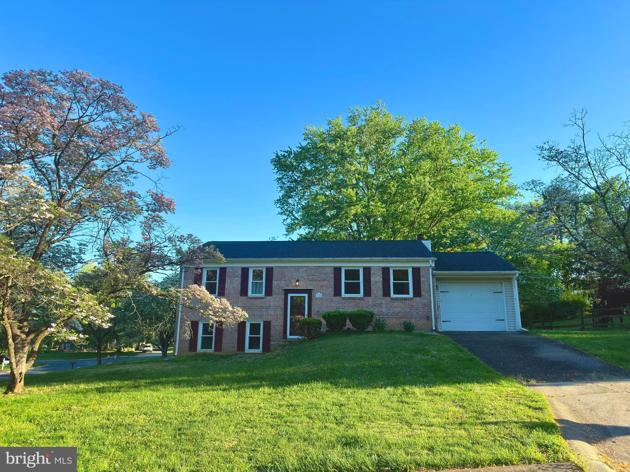 Price improved — now offered at $749,000 in the highly desirable Westleigh subdivision of North Potomac. This beautifully updated corner-lot home combines modern upgrades, functional living space, and an unbeatable location in one of Montgomery County.

Filled with natural light and designed with an open, comfortable flow, the main level features hardwood floors and a light-filled, renovated kitchen with modern finishes, stainless steel appliances, new cabinets, and enough room for everyday living and entertainment. 

The home offers 4 spacious bedrooms and 2 full bathrooms, providing flexibility for growing families, guest space, or a dedicated home office setup. The bright walkout lower level is a standout feature, showcasing a stunning Italian stone fireplace and abundant natural light — perfect for relaxing, entertaining, or movie nights at home.

Step outside to a large rear deck with multiple access points to the backyard, ideal for outdoor dining, grilling, entertaining, or enjoying a quiet morning coffee. Additional highlights include a garage, oversized driveway, and generous storage space.

Located in the heart of North Potomac, this home is just a 10-minute walk to Dufief Local Park and conveniently close to shopping, dining, major commuter routes, and the community pool. With thoughtful updates, strong curb appeal, and a newly improved price, this move-in-ready home offers exceptional value in the Westleigh community.