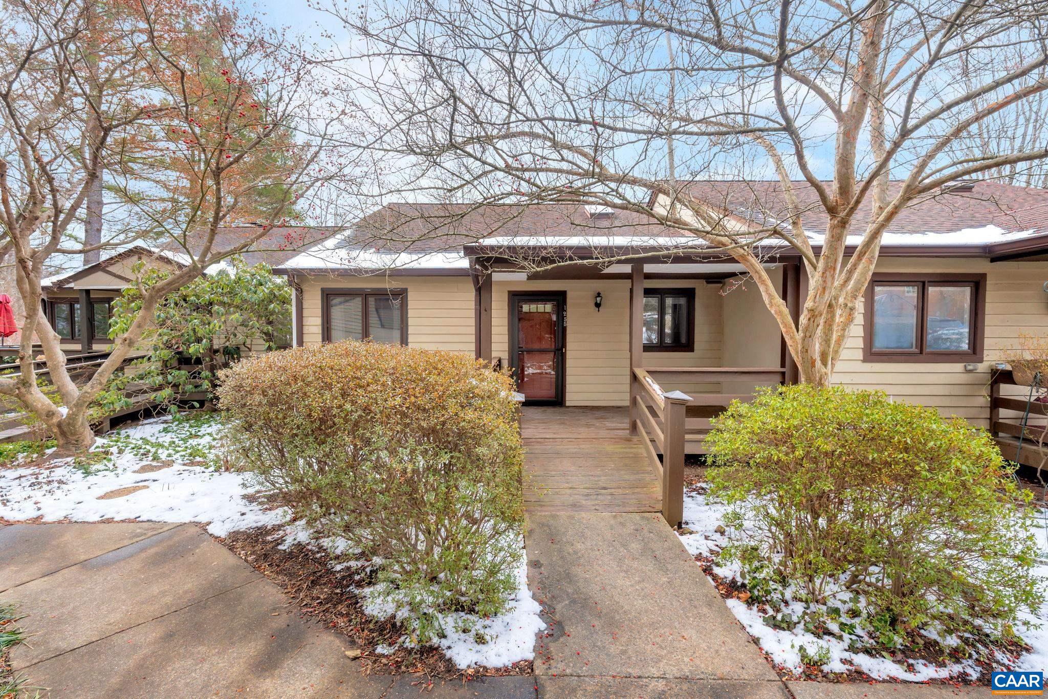 Maintenance Free Living in Branchlands Village.  This cozy cottage offers a unique floor plan that is adaptable depending on your living needs.  Home highlights include vaulted ceilings, skylights, and wood burning fireplace.  The main level offers a kitchen, dining room, living room, primary bedroom suite with full bath and a second bedroom and full bath.  The walk out terrace level features a large flex space that could be used as a third bedroom/ recreation room, full bath, and unfinished storage with second washer and dryer.  Enjoy outdoor living on the large front porch, screened porch, or patio off the lower level.  Fantastic location minutes to Rt 29, recreation, and shopping.  Schedule your showing today!,Formica Counter,Oak Cabinets,Fireplace in Living Room