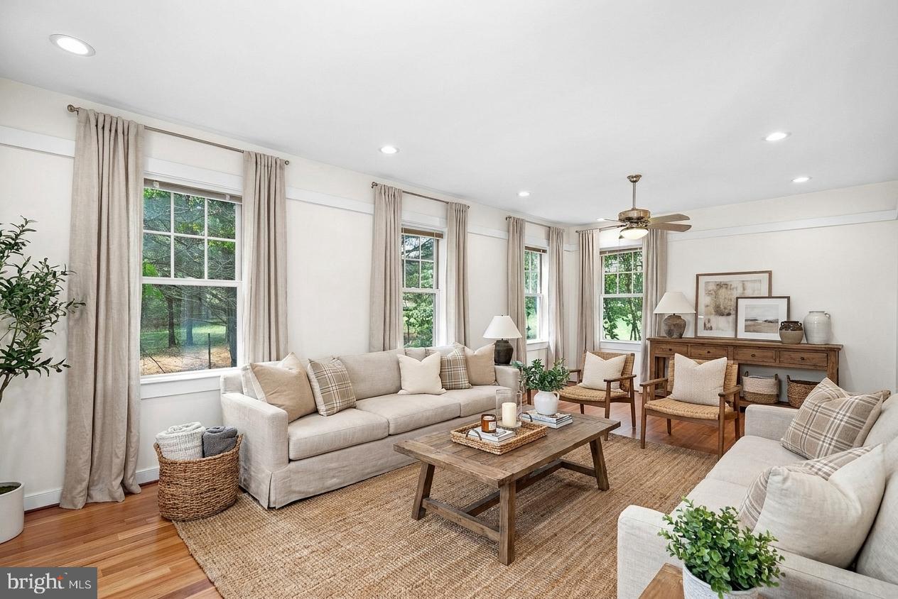 ***Extremely Motivated Sellers!!!***

Welcome to 40988 Redwing Song Ln in Lovettsville, a 5-bedroom, 3.5 bath home that offers space to grow, and gather in western Loudoun County. From the moment you arrive, the setting reflects a quieter pace while still keeping everyday conveniences within reach.
Inside, the home unfolds with multiple living areas that support both daily routines and larger gatherings. The kitchen connects naturally to these spaces, creating a central hub for meals, conversation, and day-to-day living.  There are numerous versatile areas for dining and living spaces offering creativity based on how you want to live in this home. Upstairs,  you’ll find three bedrooms, two full bathrooms, abundant closet spaces, and a convenient laundry room.
The lower level introduces an added layer of versatility with a fully finished basement apartment. With its own private entrance, full kitchen, bedroom, and separate laundry, this space functions independently from the main home, making it well suited for extended living arrangements, long-term guests, or rental opportunities. There is an additional bedroom / den on the lower level as well.  
Outside, the spacious deck and yard offers room to enjoy time outdoors, whether for recreation or quiet evenings.  The home is LEED certified and has a geothermal system which offers incredible energy bill savings!

Minutes from Lovettsville Community Park and the local shops and dining options in town, and access to Leesburg and Harpers Ferry for additional amenities, outdoor activities, and commuter routes, this is the perfect place to call home!
