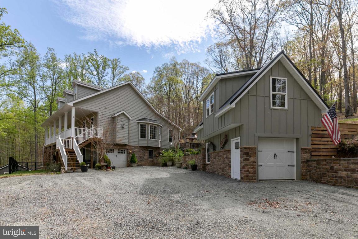 Once you arrive at 4527 Highpoint Lane, you are greeted with a feeling of serenity and peacefulness.  Surrounded by trees and mountain views that offer the privacy you want.  Stepping inside, the beautiful hardwood floors greet you and lead throughout the main level of the rooms with exceptional upgrades to include a gourmet kitchen with large counter for family and casual entertaining and separate table next to a bay window overlooking the beautiful outdoors.  The spacious Master Bedroom has a fireplace and ensuite bath and walk in closet.  Two other bedrooms down the hall share another full bath.  The lower level has all wood floors and is a wonderful guest or in-law suite, equipped with a full private kitchen and a full bath.  A great location for commuters and shopping in Northern Virginia.  Lots of fine dining in and around The Plains.  The property borders land in the VIRGINIA OUTDOORS FOUNDATION, web site - vof.org for more information.  The iron gate and gazebo do not convey.  ALSO, minutes from I66 and in the KETTLE RUN HIGH SCHOOL DISTRICT.