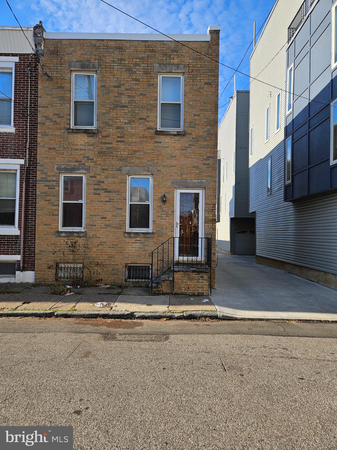 "Charming end-of-row brick home awaiting rejuvenation through renovations. The kitchen extends gracefully into a breakfast room with a sliding glass door opening to a spacious yard. A full basement offers ample potential.  The home is presented in its current 'as is' condition. For evening showings, a flashlight is recommended. Please note that the adjacent lot is not included in this sale; it serves as a drive-thru easement. Upon settlement, the buyer assumes responsibility for house cleanout, albeit minimal belongings remain. Any inspections conducted are solely for informational purposes and at the buyer's expense.
Feel free to tailor it further to better fit your intended audience or style!