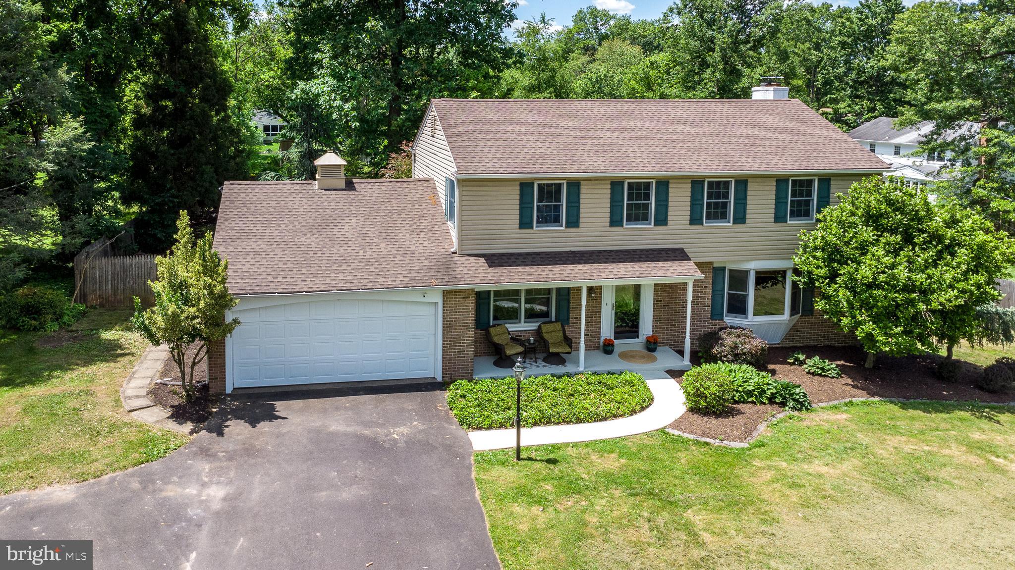 A Five-Star Delight awaits when you visit this amazing, sun-filled, 4 Bedroom, 4.5 Bath Colonial with a fantastic open floor plan, Finished Basement/In-Law Suite & resort-like rear grounds with a sparkling heated Pool & Spa, new Trex deck & Pool House w/changing room & Full Bath (1 of the 4). This special home is tucked into a tree-lined street known for its park-like setting, within the Heart of the neighborhood of Brookwood, on a gorgeous .62 acre fenced lot within walking distance of the newly remodeled Fellowship Park. A covered front porch provides the welcoming entrance. Step inside to discover a stunning open floor plan filled with natural light, w/spacious living areas that flow effortlessly together, creating an airy and welcoming atmosphere ideal for gatherings both large and small. The beautifully updated kitchen (2012) w/radiant-heated, tiled floor, features quartz counters, 42” cabinets, stainless appliances including double ovens, Bosch dishwasher 5-burner propane gas stove, side-by-side refrigerator, double sink w/garbage disposal & tiled backsplash. A custom built-in table/peninsula separates the Kitchen from the cozy Breakfast Room/Den w/wood-burning fireplace. Both rooms are open to the outstanding Family Room addition w/vaulted ceiling, radiant heated tiled floor, 2 newer skylights (2019) and a wall of windows providing an exciting view of the rear grounds & pool. A wall-mounted TV is one of 3 that are included. The spacious Dining Room offers a bay window with granite sill, & the 1st Floor Office features hardwood flooring and an included set of bookshelves. Stairs w/hardwood treads lead to the 2nd floor w/hardwood floors thru-out. The Main Bedroom includes a ceiling fan and walk-in closet and opens to the renovated Main Full Bath (2010) with tiled floor and walls, vanity w/granite counter & stall shower with tiled surround and 2 showerheads. There are 3 additional bedrooms including one w/walk-up stairs to a floored attic. The renovated Hall Bath (2008) features a tiled floor, soaking tub w/shower and 2 shower heads, and a vanity with quartz counter. The finished basement w/chair lift expands the home’s living space even further & includes an in-law suite complete w/kitchenette (added 2021) & TV, ideal for extended family, overnight guests, multi-generational living, au pair accommodations, or flexible work-from-home possibilities. Whether hosting holidays, creating separate guest quarters, or enjoying additional recreation space, this lower level offers endless opportunities to fit a variety of lifestyles. This space includes a propane gas fireplace & Bilco doors plus a new gorgeous Full Bath (2021) w/tiled floor, vanity, stall shower with 3 shower heads and marble bench. The 1st floor Laundry Rm includes the washer & dryer & provides a door with storm/screen door to access the exterior. Once you walk outside to the exciting rear grounds, you might not ever want to go back inside. The shimmering, heated pool w/lights is 10’ deep & includes a Hot Tub, sliding & diving boards. Relax or entertain in the Pool House with wall-mounted TV, kitchenette, changing room and Full Bath. A new Trex deck (2024) overlooks the Pool and the rear grounds and offers solar cap lighting and electric uplighting, making the entire area the perfect party space. A large rear yard beyond the pool offers even more recreational opportunities. Other special features include many new windows, siding & gutters (2010), new hot water heater (2024), newer roof (2019), new chimney liner, 2 floored attics, shed, & an exterior outlet for a full house generator. Walk to beautifully remodeled Fellowship Park with playground, basketball and tennis courts and baseball field. Close to Wegmans, Whole Foods, BJ’s, Costco and Trader Joe’s & minutes to the brand new Penn Medicine facility. This home on Heartwood offers a rare opportunity to enjoy comfort, flexibility, and indoor-outdoor living at its very best and is sure to win your Heart.