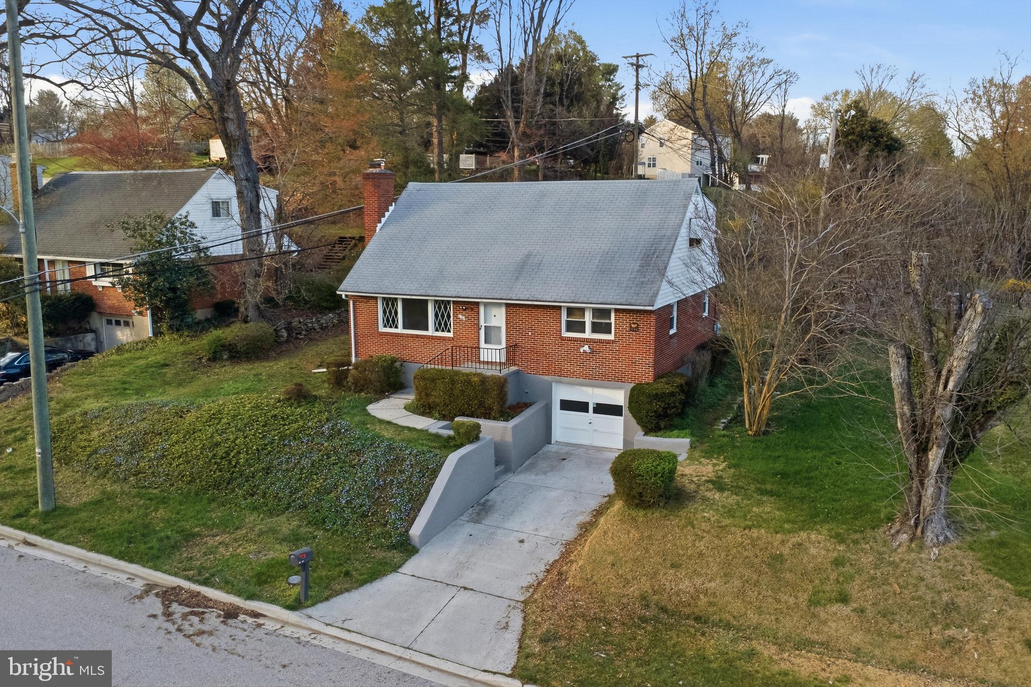 New Low Price Alert!!! 
Newly updated 5-bedroom 2.5 bath, brick cape cod on quiet street. Wood-burning fireplace in Living Room, basement clubroom with wet bar, and one car garage. Must see!