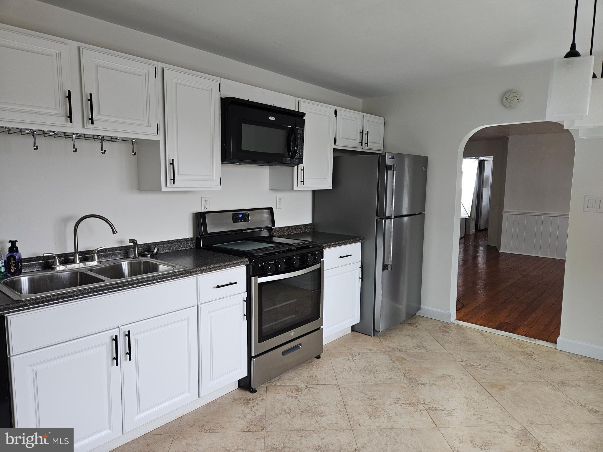 Looking to live in a quiet neighborhood but also have easy access to all the benefits of an urban city? This is the place! Unit 2 is on the 2nd and 3rd floors of a this charming twin built in 1905. Although plenty of modern amenities and updates have been made to the home, it still has tons of character, including refinished original hardwood floors, exposed brick, and lots of built-ins. The unit includes a large kitchen with a gas stove, 2 bedrooms and 1 bath, plenty of storage and closet space, AND a bonus room which would make a great play area, office, gaming lounge...the options are endless! With a large private balacony that has amazing views of the city, a patio with a firepit, and the option to use the pool in the large grassy fenced-in backyard, you'll find plenty of ways to enjoy your life here.  Additionally, this building is close to everything you could need: Septa train stration and bus lines are only a few blocks away, amazing restaurants like Great American, Gypsy, and Black Fish to name a few. You have multiple gyms and grocery stores nearby and access to the highways couldn't be easier.

Pets (max 2) are okay on a case-by-case basis. There will be an extra $250 refundable security deposit as well as $25/mo additional rent for the first pet and $15/mo for a 2nd pet.

Washer and Dryer are in the basement. Each unit has their own set for your convenience. Snow removal and lawn care are provided by the landlord. Tenant pays gas and electric and Owner pays water and sewer. No central air but owner will provide window units.  

Please note: SF of unit is approximate. Pictures will be uploaded in a few days as well as NTN application details. There is an application fee for every adult tenant applicant. Lease requires First, Last, and Security deposit.
