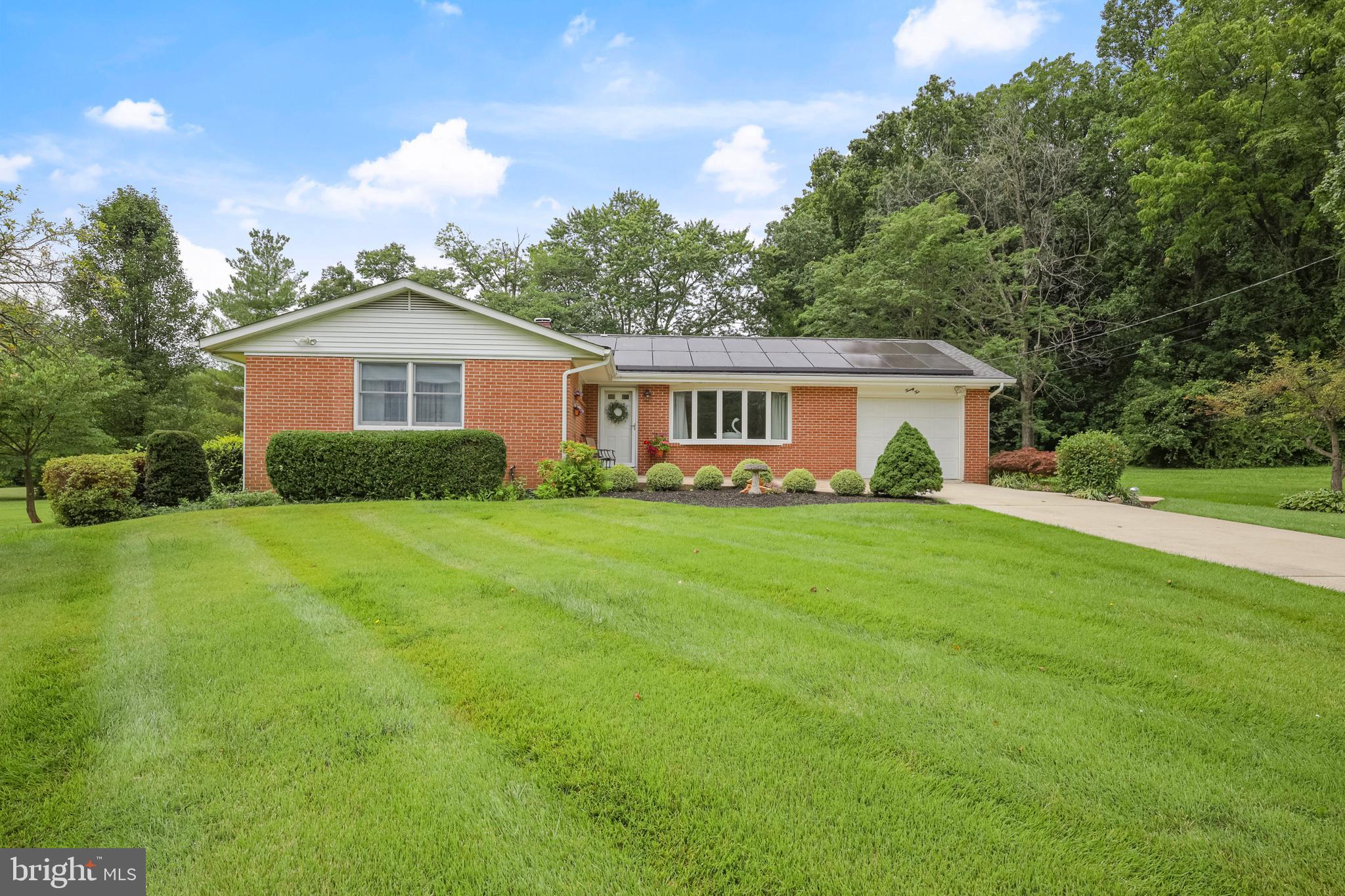Charming Churchville Rancher with additional half acre lot next door!  The gorgeous curb appeal will draw you in instantly and offers a spacious backyard with a beautiful garden and oversized shed. Meticulously maintained home on 3/4 of an acre in the heart of Churchville. Three bedrooms, all with original hardwood floors. Hardwood floors are throughout the home under carpeted areas as well. Large closets in all bedrooms along with tons of natural light. Basement is partially finished and ready for a great mancave or additional living space. Ample storage in the basement with water softener system installed. Make this home yours today and call Churchville home!