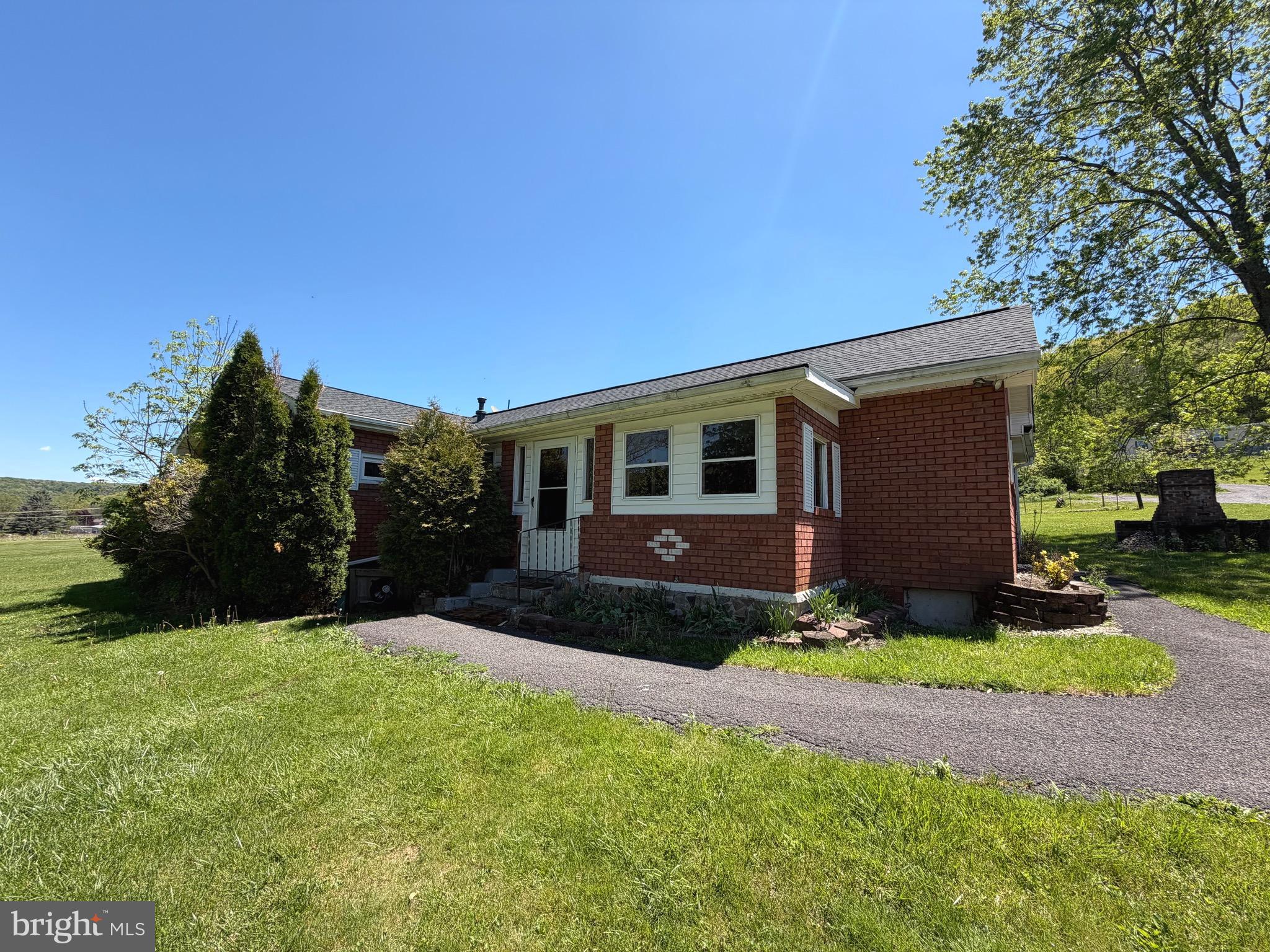 ** Seller is motivated and will consider all reasonable offers**
Welcome to this charming 3-bedroom, 1-bath brick home on almost an acre of land on Spataro Lane! Nestled between Frostburg and Mount Savage, this property offers privacy, scenic views, and plenty of space to enjoy both indoors and out.

A standout feature is the oversized 3-car garage with additional storage space above — perfect for vehicles, hobbies, or extra storage needs. The property also includes a spacious storage shed, an enclosed front porch, and a gazebo in the backyard, creating great spaces for relaxing or entertaining.

Inside, the home offers plenty of potential needing some minor updates. Major improvements have already been completed, including a roof that is just 2 years old with gutter rain guards installed, as well as a hot water tank that is only 5 years old.

If you’re looking for a peaceful setting with room to grow and endless possibilities, this could be the perfect place to call home!