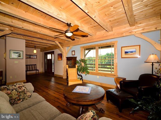 SITED ON OVER 17 ACRES OF PRISTINE LAND THIS CAREFULLY CRAFTED POST & BEAM HOME BOASTS PANORMIC VIEWS FROM EVERY ROOM OR ON THE TREX WRAPAROUND FRONT PORCH. THIS IS A ONE OF A KIND HOME WHOSE INTERIOR RIVALS EXTERIOR AMENITIES WITH MILLED TONGUE AND GROOVED FLOORS FROM A 270 YEAR OLD LOG HOME.  GOURMET OPEN KITCHEN WITH CORK FLOOR, INDUCTION STOVE, DBL BOSCH OVENS HUGE PANTRY.