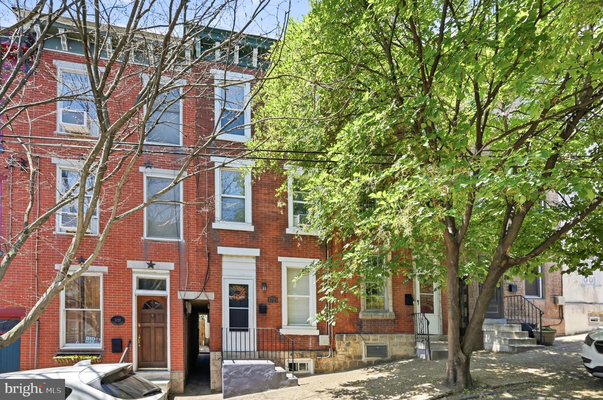 Classic East Falls Rowhome just steps from some of Philadelphia's most beloved outdoor spaces! This 4 Bedroom/1.5 Bath home offers 1,792 square feet of living space spread across three levels, providing a flexibility and room count that is increasingly difficult to find at this price point. The first floor features comfortable living and dining spaces, a convenient powder room, and easy access to the backyard and side alley so you don’t need to drag your trash through your living room.  The bright, modern kitchen looks out over the backyard, has all the necessary appliances, granite countertops and plenty of cabinetry.  Upstairs, the four bedrooms are spread across the second and third floors, creating separation and privacy that works equally well for families, guests, home offices, hobby spaces, or workout rooms. The 2nd floor full bath is of ample size and boasts a double sink vanity and a large walk-in shower with tile surround and a foot massaging river pebble floor. The basement provides additional storage space and is home to the new gas heater and new gas water heater, offering valuable peace of mind.  Out back, you'll find a fully fenced, maintenance-free rear yard highlighted by a large paver patio that is perfectly suited for summer cookouts, outdoor dining, gardening in containers, or simply relaxing after a long day.  Location is where this property truly shines. East Falls continues to be one of Philadelphia's best kept secrets thanks to its unique combination of city convenience and access to nature. Just minutes away are Kelly Drive, the Schuylkill River Trail, Wissahickon Valley Park, and countless opportunities for walking, running, cycling, and outdoor recreation. Commuters will appreciate the proximity to the East Falls SEPTA Regional Rail Station, Route 1, I-76, and Center City. The neighborhood is also home to a growing collection of local favorites including Vault + Vine, Wissahickon Brewing Company, In Riva, Fiorino, neighborhood cafes, restaurants, parks, and community gathering spaces that give East Falls its distinctive charm and strong sense of community.  Homes in East Falls continue to attract buyers looking for character, convenience, and an active lifestyle.