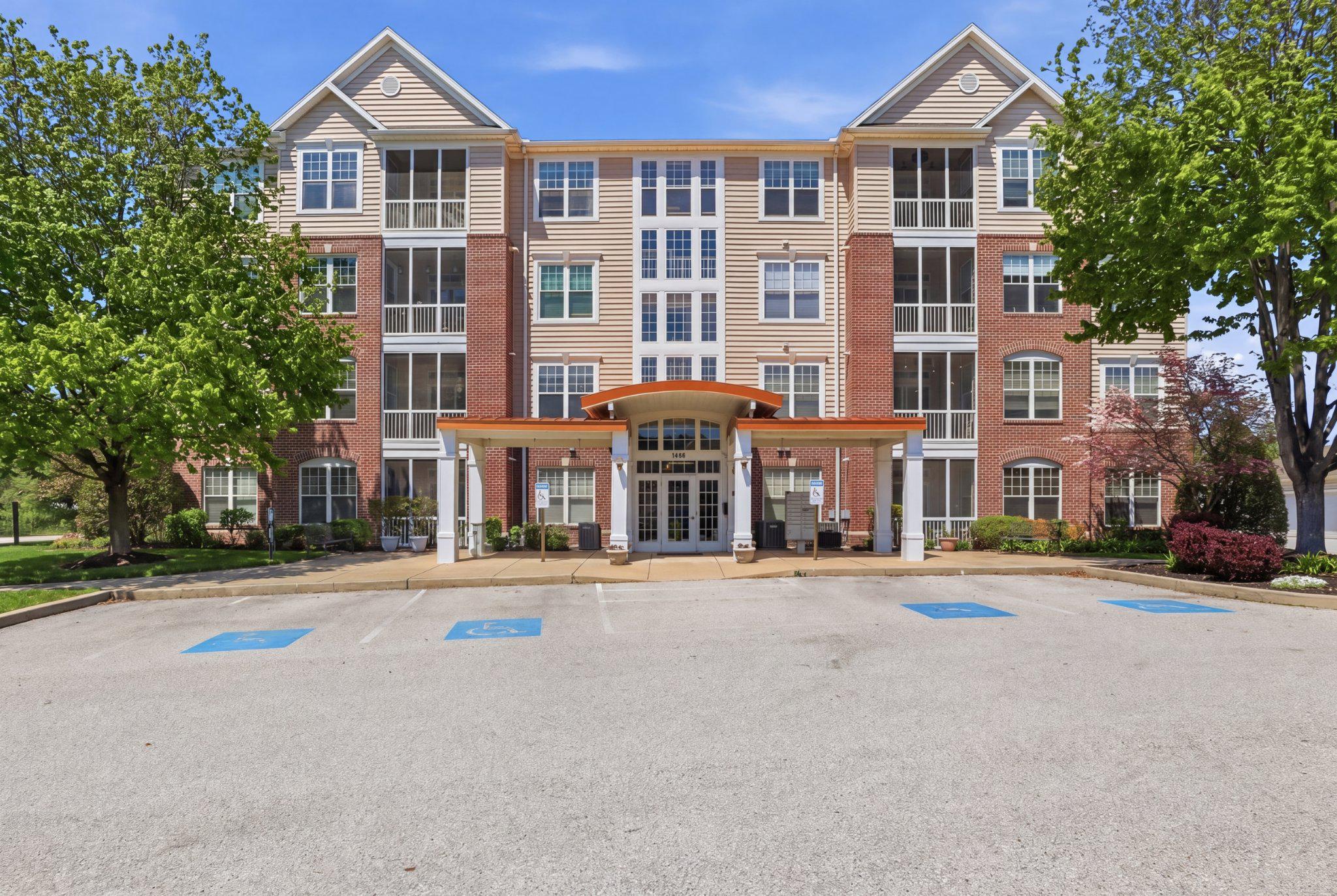 Welcome to 1010 Crest Way, Unit 103, nestled in the esteemed Regents' Glen gated golf course gated community. This elegant residence is in The Greenleigh Condos 55+ community and offers the convenience of single-level living, ensuring all your needs are met with ease. It features 2 spacious bedrooms, 2 full baths, a comfortable living room, a formal dining room, a cozy den, a breakfast area, and a screened-in porch—perfect for enjoying the serene surroundings. Inside, you will love the new LVP floors, new stainless steel appliances, GAS stove, beautiful 42" Light oak cabinetry and tile backsplash all complemented by a modern tankless hot water heater and new HVAC for energy efficiency. Residents enjoy a secured entrance for peace of mind and ample parking.  Regents' Glen offers a wealth of amenities, including golf course membership opportunities, dining privileges at the on-site facility, swimming pool access, and a fitness center. The community's picturesque setting features beautifully lit sidewalks and a tranquil pond, enhancing the ambiance for evening strolls. This home is ideally located near York Hospital and Memorial Hospital, and within walking distance to the NCR Trail, perfect for outdoor enthusiasts. It’s also close to local hubs, providing easy access to shopping and entertainment. Embrace the lifestyle that Regents' Glen offers, with its award-winning Arthur Hills-designed golf course, well-maintained grounds adorned with century-old white oak trees, and the scenic Codorus Creek. This home seamlessly blends comfort, style, and convenience—Condo fees cover water and trash fees as well as 24 hour lighting inside the common areas of the building.