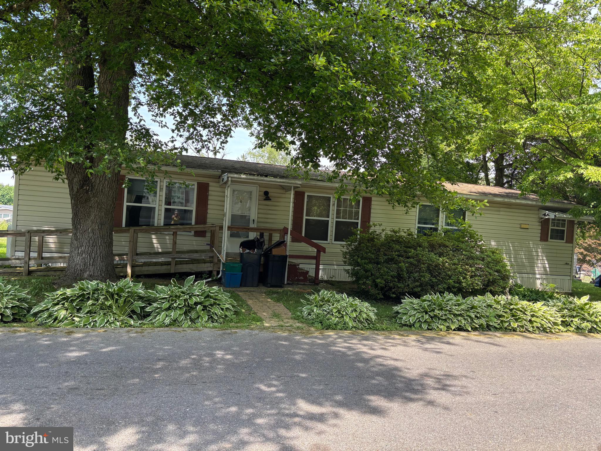 BACK ON THE MARKET. Welcome to this 3-bedroom, 2-bath home. Located in the highly regarded Twin Valley School District.  Land rent of $738/month with sewer and trash paid separately at $73/month.  There is a $10 discount paid monthly if  paid on line. Water is billed separately according to usage.

This property offers a convenient location close to shopping, dining and major routes - making everyday living simple and stress free.  Inside you will find a comfortable layout with spacious bedroom, 2 full bathrooms, and bright living area perfect for relaxing and entertaining...waiting for a few finishing touches.

Designed with accessibility in mind, the home has a ramp to front door accessible, providing ease of movement and added comfort for all residents.
