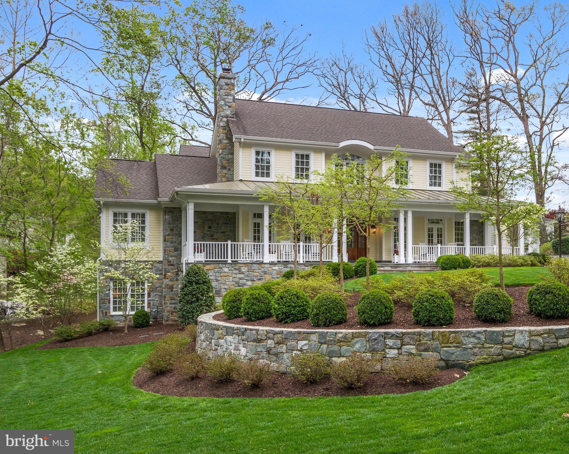 Custom designed home with over 8,300 sf of living * Circular flow for large formal gatherings & a large open kitchen leading to a slate patio with stone fireplace for intimate gatherings *  Four fireplaces, great room with cherry paneling and coffered ceiling & expansive walkout lower level * Ten foot ceilings * Path to library, community center & park with basket ball & tennis courts *