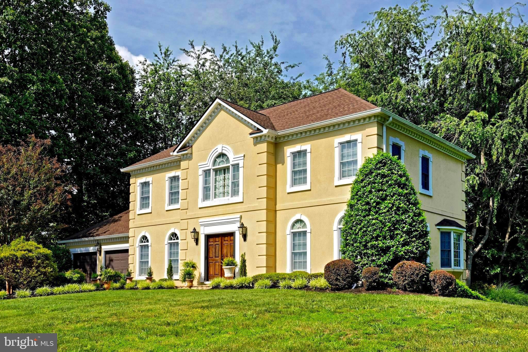 Elegant design, exceptional entertaining spaces, and a private 1.21-acre setting come together in this stunning custom-built French Country residence, tucked away on a quiet dead-end lane in the sought after location just west of Middleburg. A stately stucco exterior, Palladian-inspired window details and a soaring two-story foyer create a memorable first impression. Mahogany double doors open to a gracious foyer featuring porcelain tile flooring and a sweeping quarter-turn staircase. At the heart of the home is a beautifully appointed gourmet kitchen with stainless steel appliances, granite countertops and upgraded cabinetry. The kitchen flows seamlessly into the breakfast area and family room, where a dramatic wall of windows fills the space with natural light. A covered patio extends the living space outdoors and provides the perfect setting for al fresco dining and sunset views. Designed for both formal and casual entertaining, the home also features an elegant dining room with a bay window and arched opening to the formal living room. Upstairs, the spacious primary suite offers two walk-in closets and a luxurious spa-inspired bath with a jetted soaking tub and oversized double shower. Two additional guest bedrooms feature generous closet space and share a well-appointed hall bath. The unfinished lower level presents endless possibilities, with ample space for a recreation room, home gym, additional storage, and even a potential fourth bedroom thanks to a full-sized window. Additional highlights include gleaming hardwood floors, new roof (2016), two new Trane HVAC units, water heater, and central vacuum system (2017). A two-car front-load garage and oversized driveway provide added convenience. Enjoy the best of village and country living just 3 minutes from downtown Middleburg, home to beloved annual traditions including the Middleburg Film Festival, the 1000 Miglia Warm Up USA, Oktoberfest, and Christmas in Middleburg. Nearby wineries, breweries, and a cidery offer endless opportunities to explore Virginia wine country, while commuters will appreciate the easy access to Dulles International Airport, just 35 minutes away, and downtown Washington, D.C., approximately one hour.