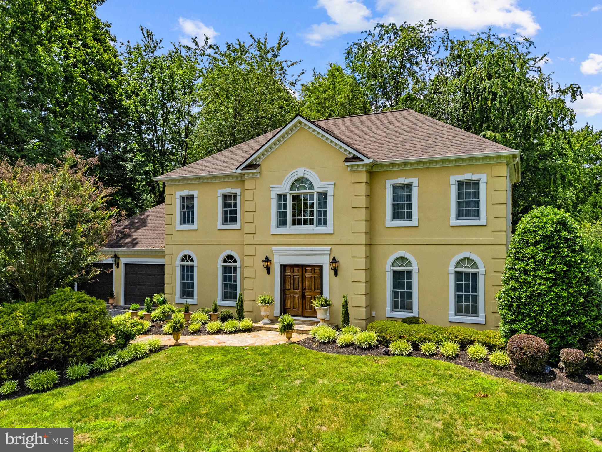 Elegant design, exceptional entertaining spaces, and a private 1.21-acre setting come together in this stunning custom-built French Country residence, tucked away on a quiet dead-end lane in the sought after location just west of Middleburg. A stately stucco exterior, Palladian-inspired window details and a soaring two-story foyer create a memorable first impression. Mahogany double doors open to a gracious foyer featuring porcelain tile flooring and a sweeping quarter-turn staircase. At the heart of the home is a beautifully appointed gourmet kitchen with stainless steel appliances, granite countertops and upgraded cabinetry. The kitchen flows seamlessly into the breakfast area and family room, where a dramatic wall of windows fills the space with natural light. A covered patio extends the living space outdoors and provides the perfect setting for al fresco dining and sunset views. Designed for both formal and casual entertaining, the home also features an elegant dining room with a bay window and arched opening to the formal living room. Upstairs, the spacious primary suite offers two walk-in closets and a luxurious spa-inspired bath with a jetted soaking tub and oversized double shower. Two additional guest bedrooms feature generous closet space and share a well-appointed hall bath. The unfinished lower level features a full sized window and offers endless possibilities with ample space for a home office, recreation room, home gym or additional storage. Additional highlights include gleaming hardwood floors, new roof (2016), two new Trane HVAC units, water heater, and central vacuum system (2017). A two-car front-load garage and oversized driveway provide added convenience. Enjoy the best of village and country living just 3 minutes from downtown Middleburg, home to beloved annual traditions including the Middleburg Film Festival, the 1000 Miglia Warm Up USA, Oktoberfest, and Christmas in Middleburg. Nearby wineries, breweries, and a cidery offer endless opportunities to explore Virginia wine country, while commuters will appreciate the easy access to Dulles International Airport, just 35 minutes away, and downtown Washington, D.C., within approximately one hour.