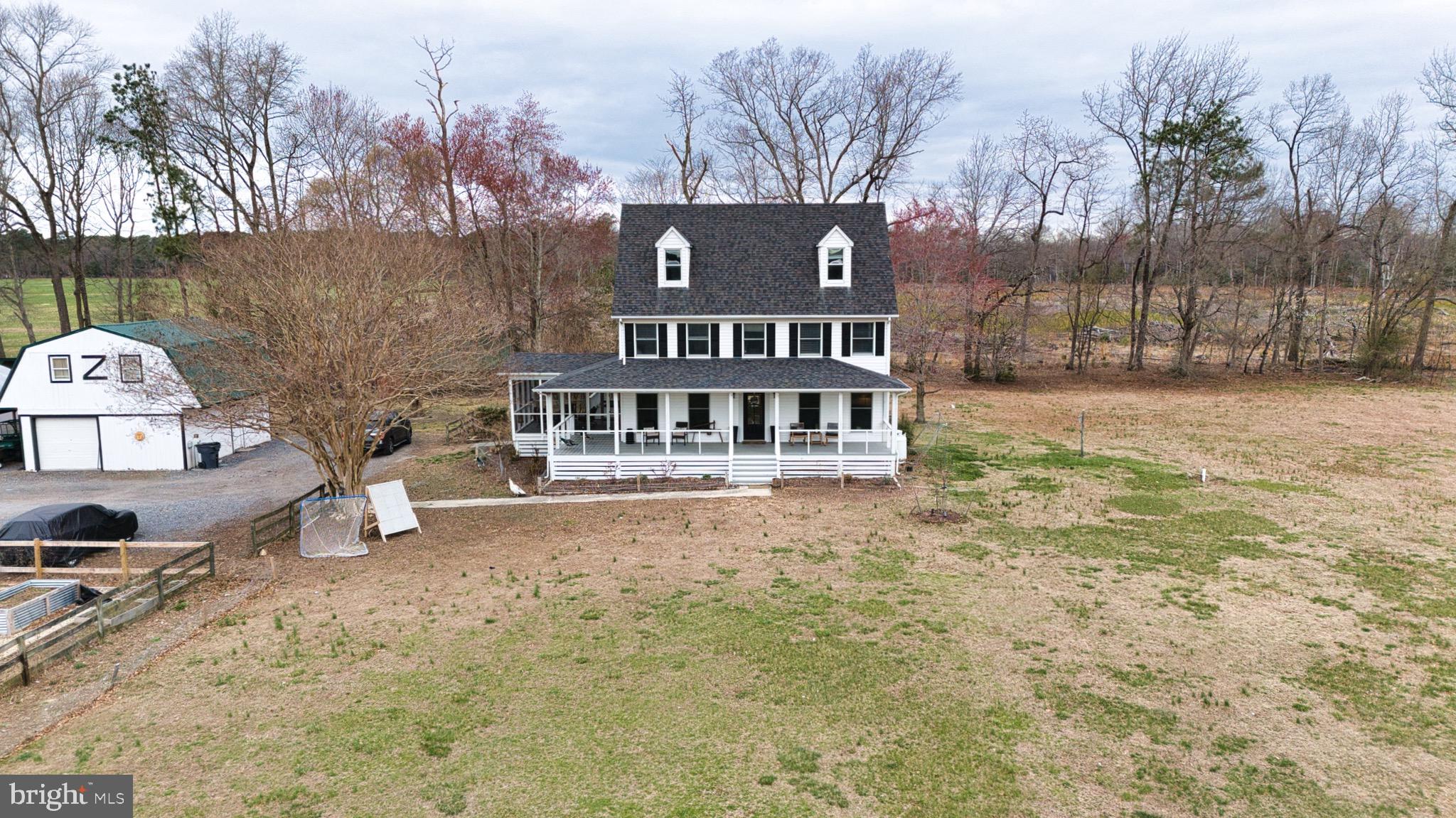 Discover a truly rare opportunity where lifestyle, income potential, and homeownership come together on this expansive 12.7-acre, two-parcel property zoned rural—offering unmatched flexibility and endless possibilities.
Currently operating as a productive orchard, greenhouse operation, and microgreens business, this property is thoughtfully equipped for both personal enjoyment and entrepreneurial pursuits. Features include active greenhouses with heaters, fans, and programmable boom spray, supported by two separate wells, along with a chicken coop, shed, and detached garage. The established microgreens business—servicing local restaurants—may be acquired by the new owner, creating a seamless transition for those seeking a turnkey venture.
The residence itself is a well-appointed 4-bedroom farmhouse offering over 2,000 square feet of comfortable living space. The main level features a granite countertop kitchen overlooking the backyard, along with both a family room and living room, and a dining area that opens to a rear deck—perfect for entertaining or enjoying the peaceful surroundings.
Upstairs, you’ll find a primary ensuite and two additional bedrooms, while the third floor offers a private bedroom with its own full bath, ideal for guests or extended living.
Surrounded by mature landscaping, fruit-bearing orchards (including blueberries, peaches, apples, grapes, and blackberries), and a tranquil natural setting, the property also includes additional features such as porches, a screened-in area, pond, and wooded boundaries. All new irrigation was recently added to the orchard. The detached garage offers plumbing for a potential apartment, adding even more versatility.
Whether you're looking to expand an agricultural operation, create a homestead, or invest in a unique income-producing property, this is a one-of-a-kind opportunity to own a truly special property.