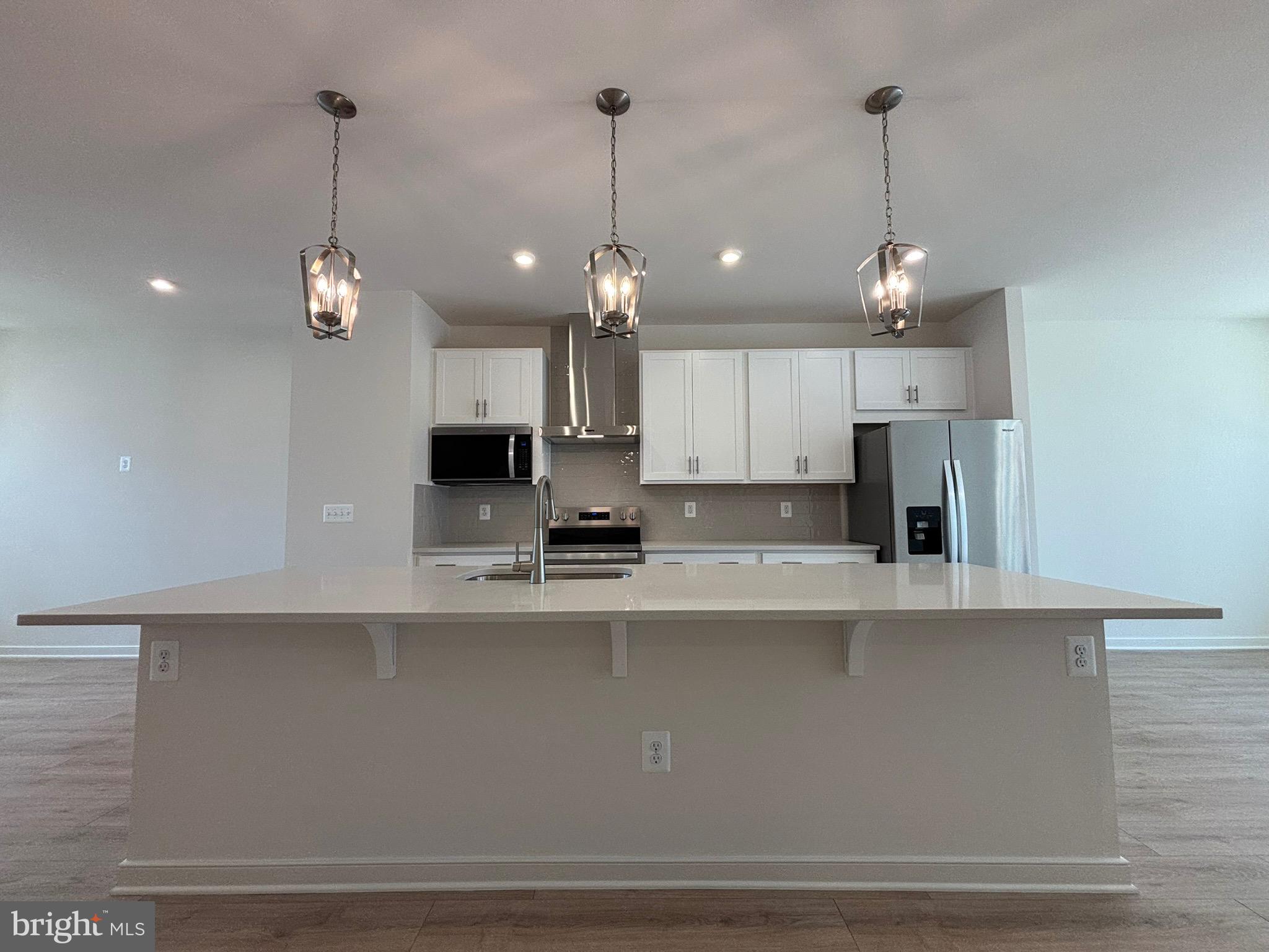 *NEW CONSTRUCTION* Special All-In Price, for June Move-In! Receive up to 3.99% 5/1 ARM [5.94% APR] FHA & VA Rate with Choice Lender on Quick Move-In Homes!* Monthly payments are made easier during Beazer Friends & Family Sales Event until 7/31. Hometown heroes get $5,000 until 7/31(restrictions apply; see New Home Counselor for details). Step into the Potomac, a superior 3-level townhome with a 2-car garage in the sought-after Cascade Landing community in Dumfries, VA. This thoughtfully designed home offers 4 bedrooms and 3.5 baths, all with 9 ft. ceilings for an open, airy feel. The gourmet kitchen is a showpiece, featuring upgraded white cabinets, quartz countertops, ceramic tile backsplash, range hood, and stainless- steel Whirlpool appliances. Designer laminate flooring flows throughout the main level, including the kitchen, walk-in pantry, dining room and great room. A deck is off the main level to extend gatherings and relaxation. The luxurious primary suite includes a generous walk-in closet and a spa-inspired bathroom with raised double vanities, quartz countertops, and a shower with designer ceramic tile. A deck is off the main level to extend gatherings and relaxation. Plus, the garage includes an EV charger-compatible outlet, making this home future-ready. Enjoy low-maintenance living with affordable HOA dues (no hidden developer fees) so you can put your savings toward what matters most. Cascade Landing offers a welcoming neighborhood with a playground, easy walkability, and quick access to premier parks and trails. Located just 2 miles from Marine Corps Base Quantico (North Gate) and 2.5 miles from I-95, commuting is effortless. Commuters into DC and the surrounding areas will enjoy proximity to the Quantico Virginia Railway Express (VRE) Station (4.8 miles) and the Dumfries Commuter Lot with park and ride access (2.1 miles). Beazer Homes at Cascade Landing are designed to live better day to day, with energy-efficient construction that lowers monthly utility costs, thoughtful design options that make personalization simple, and Mortgage Choice, where our top lenders help you compare options and save money on your home loan. This high-performance home is built to lower your total cost of homeownership through reduced utility bills, durable materials, and high-quality construction that minimizes long-term maintenance costs. Beazer Homes is proud to be America’s #1 Energy-Efficient homebuilder. Our FY25 average gross HERS score of 32 (38 excluding solar) was the lowest of the publicly reported scores among the top 30 U.S. homebuilders by volume identified by Builder Magazine’s Top 100 List (based on 2025 total closings). Get protection against rising energy costs without changing how you live. Every Beazer home is pre-wired for solar, making it easier and more affordable to add a renewable system when you are ready. Photos of actual home. Plus, you’re close to Fortuna Center Plaza, Locust Shade Park, and dining favorites and entertainment. Model Home Hours: Mon–Sun, 11 AM–6 PM. Use 17910 Alicia Avenue, Dumfries, VA 22026 for GPS directions. Please go to the model home listed here first.