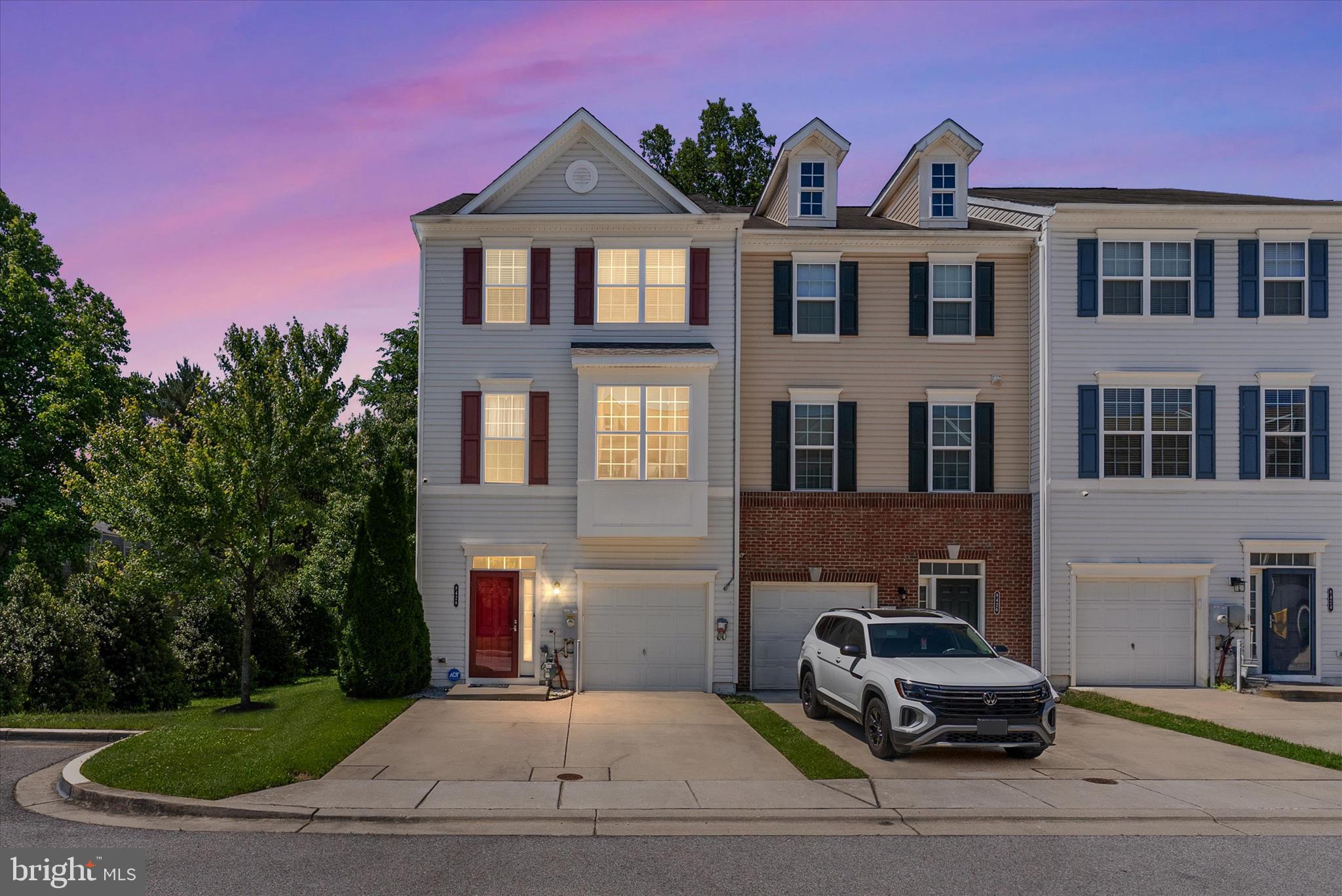 This beautifully appointed four-bedroom end-unit townhome in the sought-after Jacobs Forest community with a community playground, offering more than 2,300 square feet of finished living space. Built in 2016, the home features a thoughtfully designed open floor plan complemented by tasteful modern finishes throughout. The entry level includes a versatile walk-out living area with a full bath and access to the fenced rear yard, making it well suited for a home office, fitness room, recreation space, or fourth bedroom. The main level is filled with natural light complimented by a beautifully designed kitchen set on hardwood flooring and featuring quartz countertops, brand new stainless steel appliances, gas cooking, a large center island, and abundant cabinetry. Sliding glass doors lead to a private composite deck, creating an ideal space for relaxing or entertaining. Upstairs, the primary suite offers dual closets, including a walk-in closet, and a private bath with a walk-in shower. Two additional bedrooms, a full hall bath, and a conveniently located laundry area provide everyday comfort and functionality. All bedrooms are equipped with ceiling fans, window shades, and curtains. Additional highlights include an attached one-car garage and ample storage throughout. Solar panels installed on the rear roof help enhance energy efficiency and reduce utility costs. Enjoy quick access to the Severn Run Natural Environment Area, neighborhood walking trails, and nearby parks. Arundel Mills is just minutes away with over 200 retailers, restaurants, and entertainment options. Commuting is a breeze with proximity to Fort Meade, BWI, and major routes into Baltimore and Washington, DC.