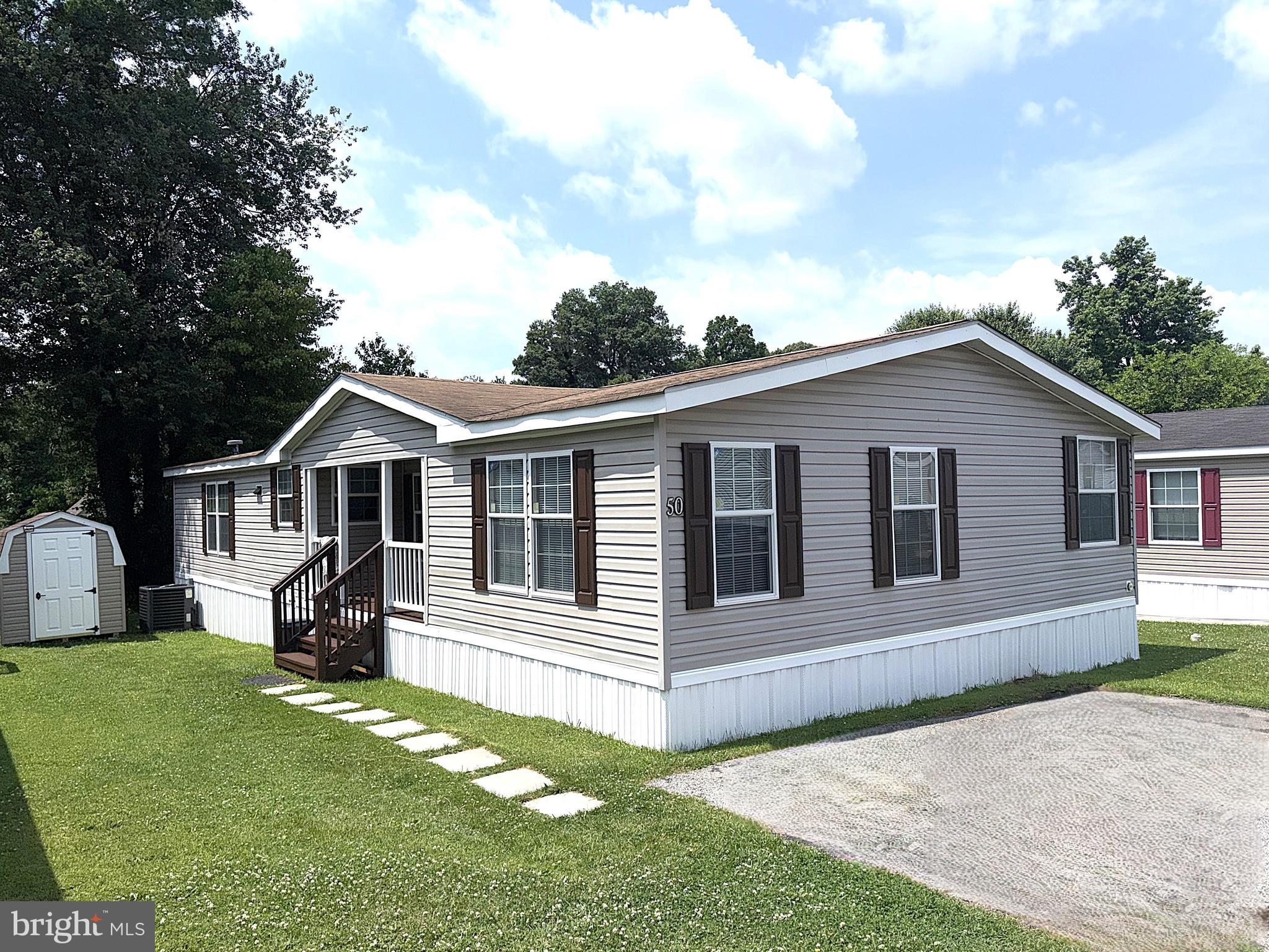 Beautiful Doublewide in Sought After Arundel Mobile Village! Almost 1600 Square Feet with Recent Updates Including HVAC, New Shed, Gas Range, Microwave, Light Fixtures and Living Room Carpet. Inside this home Features a Big Kitchen with Plenty of Cabinets, Counter Space and a Kitchen Island, a Spacious Living Room, a Bonus Office Nook and a Large Primary Bedroom with a Private Bathroom, Garden Soaking Tub, Separate Shower and a Walkin Closet. Outside you have a Covered Front Porch to Enjoy your Morning Coffee and a Secure Storage Shed. Great Odenton Location close to Schools, Parks, Shopping and Restaurants.  Close to RT 32 and 97. Five Minutes to the MARC Train and Ten Minutes to Ft Meade.  Contact me Today to Schedule a Private Tour!